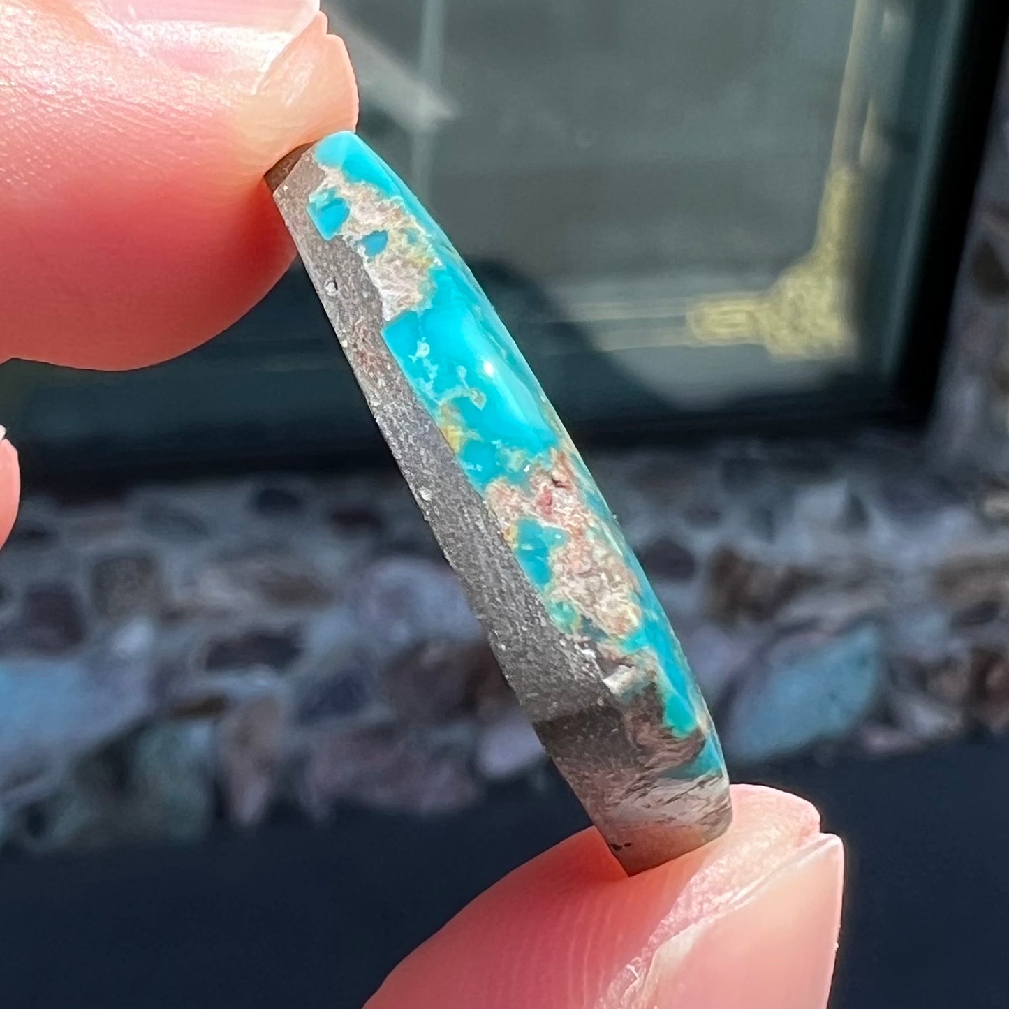 A loose turquoise stone from the Godber-Burnham mine in Lander County, Nevada.