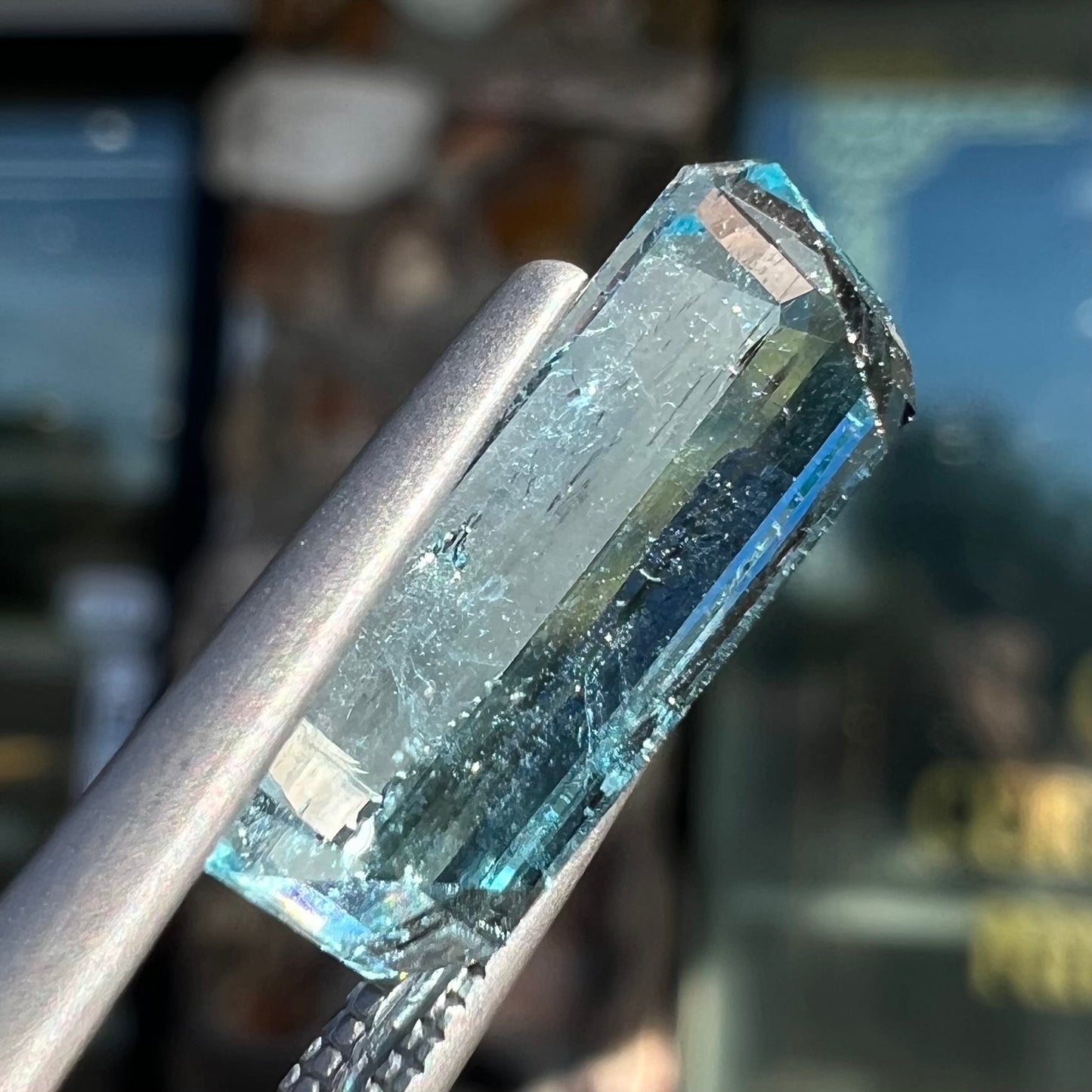 A loose, emerald cut aquamarine stone from Vietnam. The stone is an ice blue color.