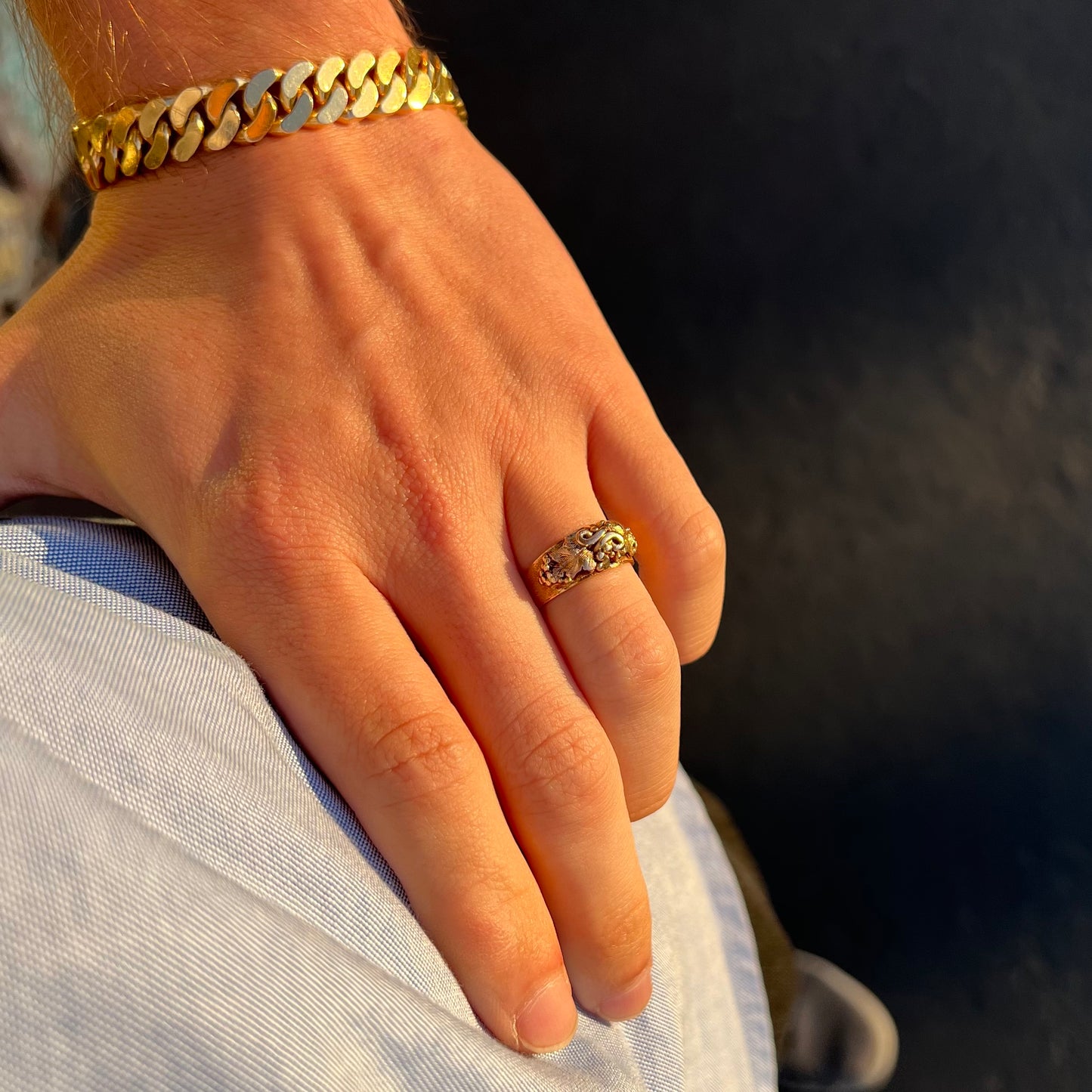 A ladies' two-tone Black Hills gold ring featuring the motif of leaves. The inside of the ring is stamped "16K" and "BARCLAY".