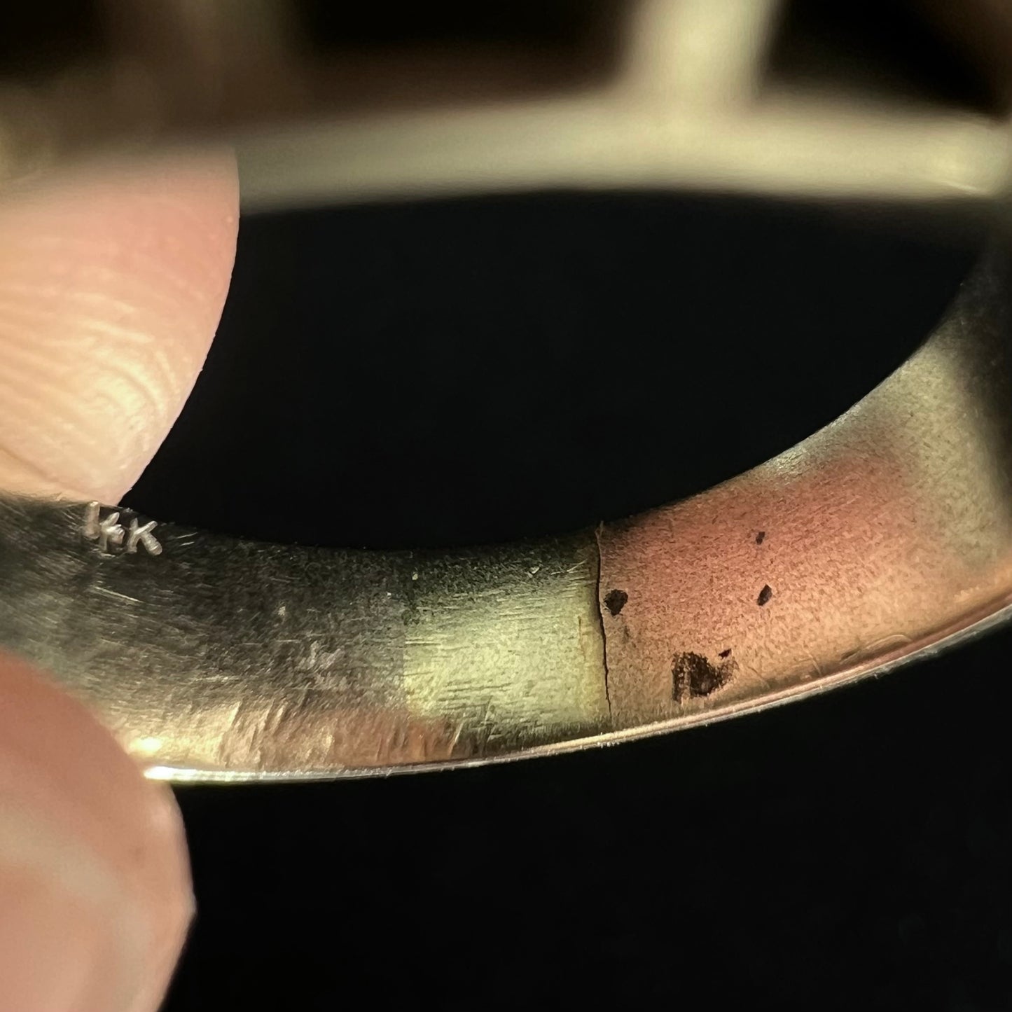 A vintage, 1940's style white gold diamond wedding ring set with a 0.68ct round diamond. The diamond has a noticeable black crystal inclusion.