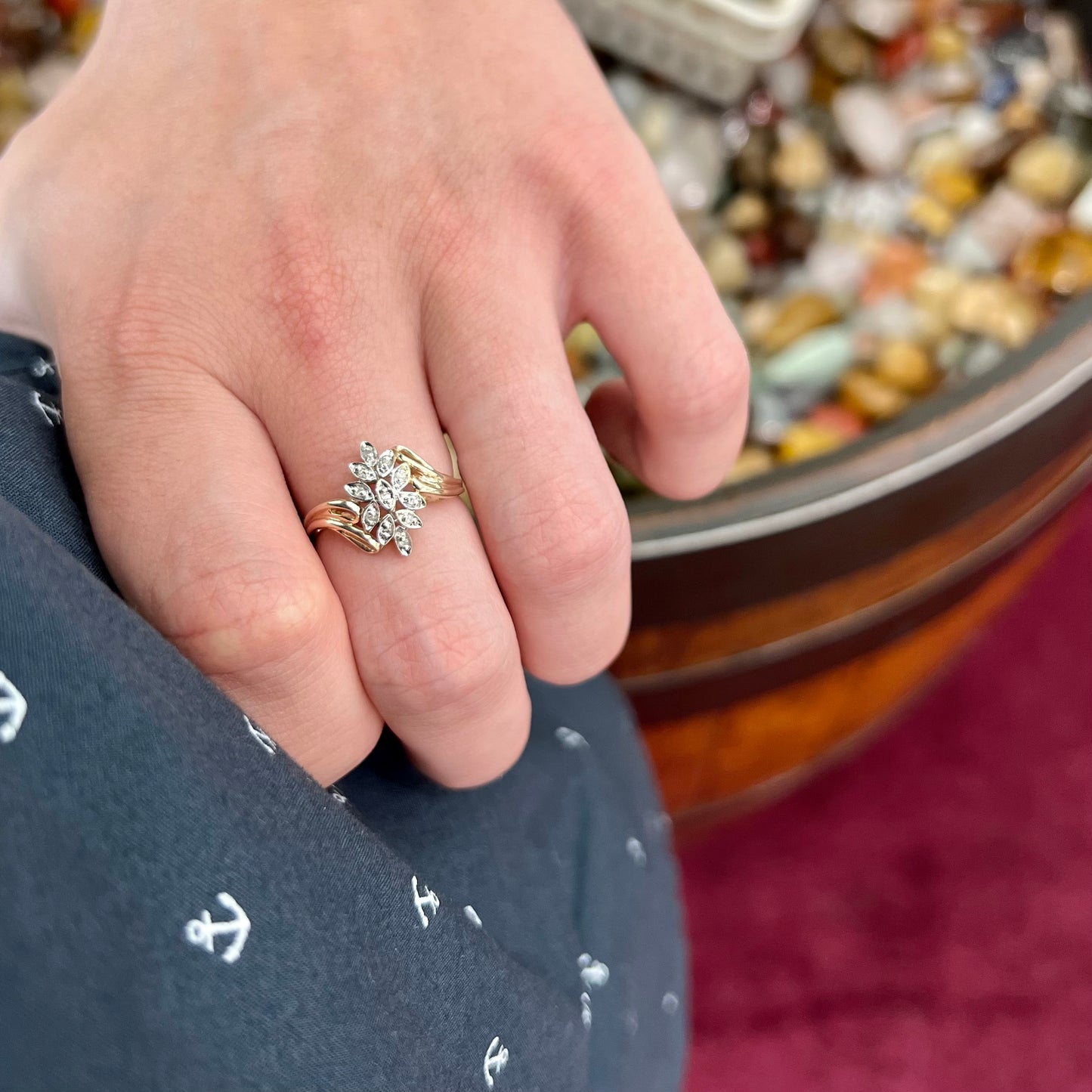 A ladies' vintage style gold diamond cluster ring.