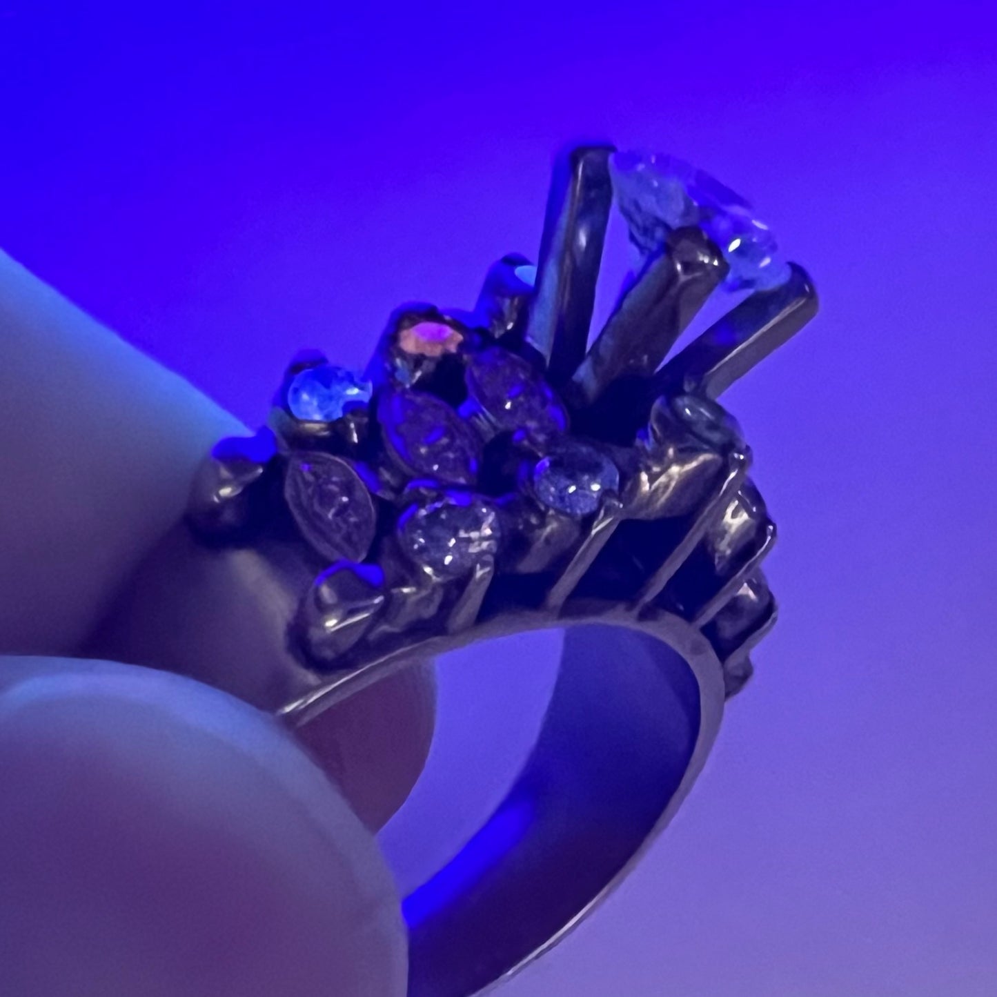 A vintage, 1940's style white gold diamond wedding ring set with a 0.68ct round diamond. The diamond has a noticeable black crystal inclusion.