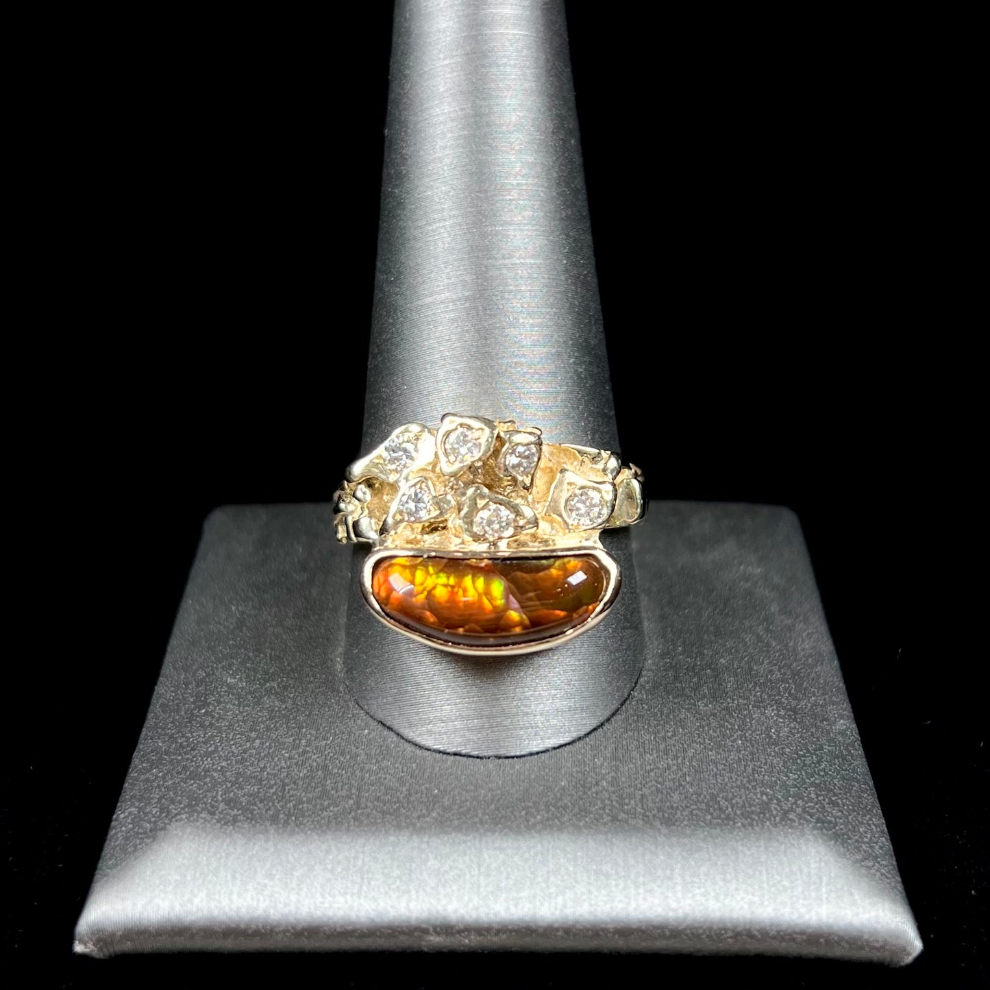 A ladies' nugget style yellow gold Mexican fire agate and diamond ring.