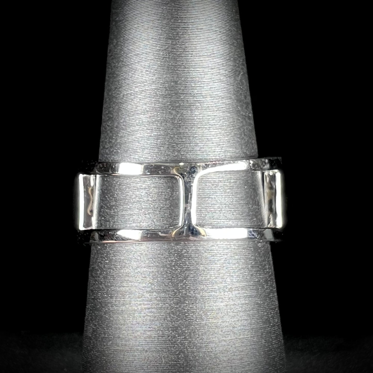 A ladies' marquise cut blue topaz and cubic zirconia accented ring cast in sterling silver.