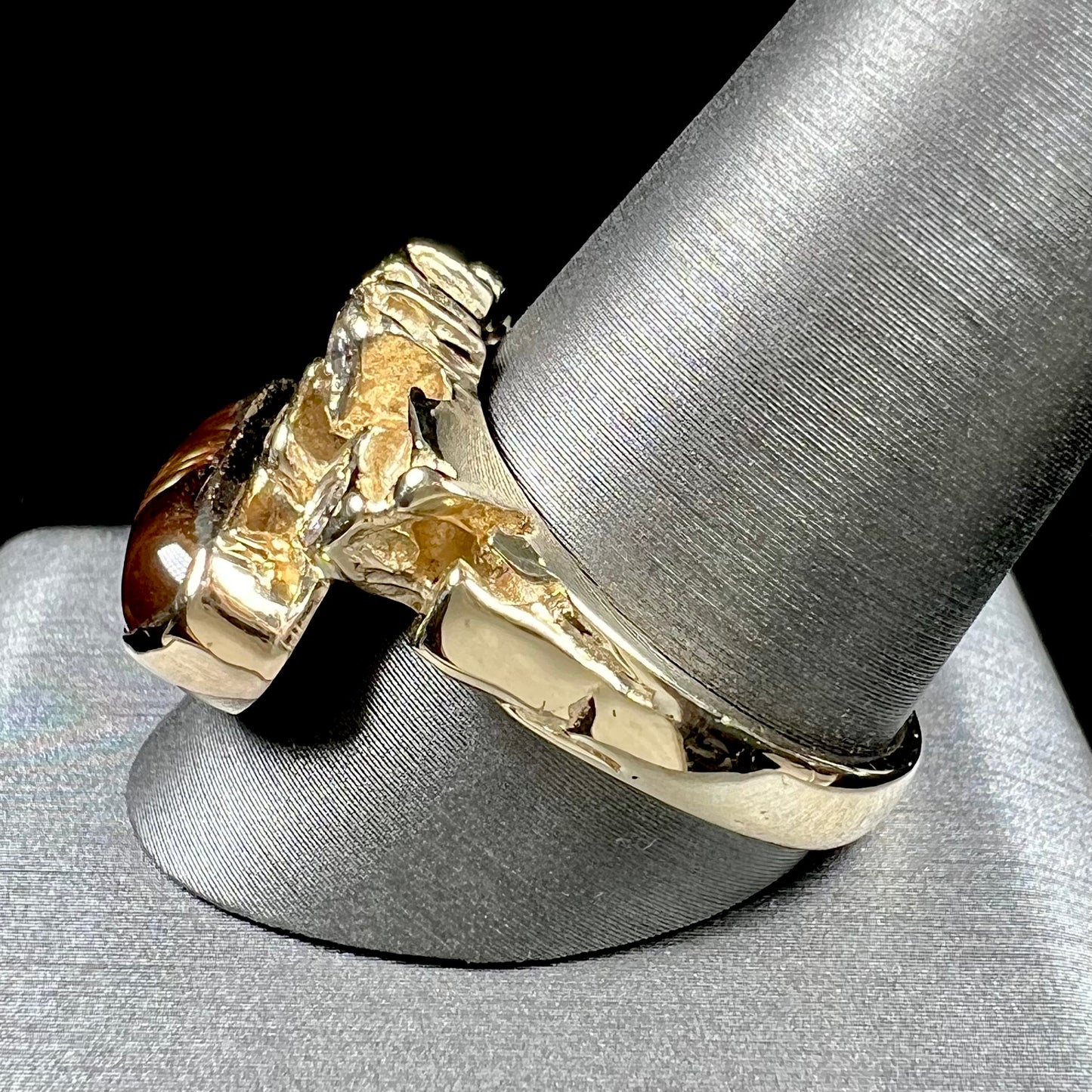 A ladies' nugget style yellow gold Mexican fire agate and diamond ring.