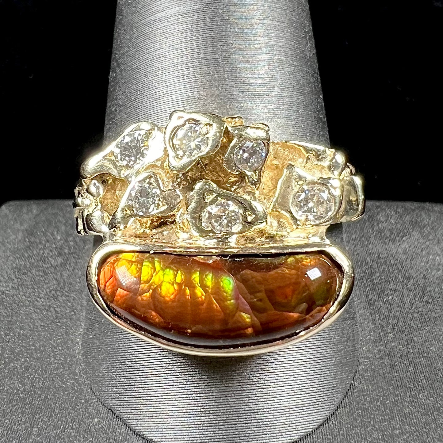 A ladies' nugget style yellow gold Mexican fire agate and diamond ring.