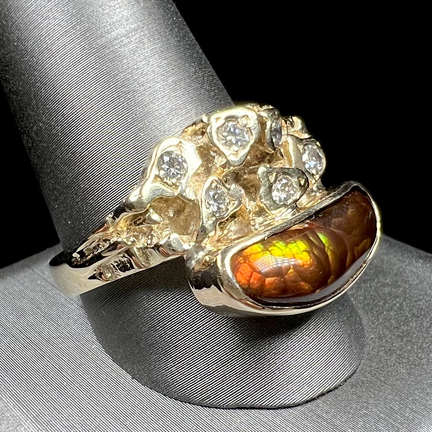 A ladies' nugget style yellow gold Mexican fire agate and diamond ring.