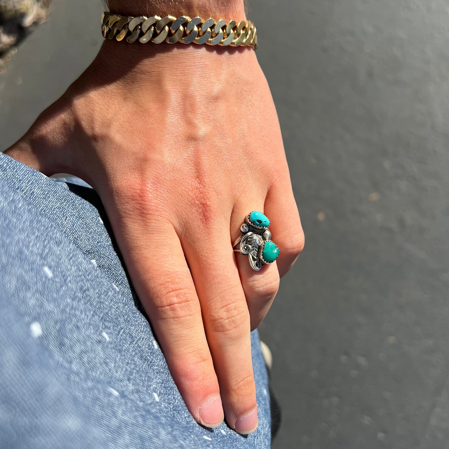A ladies' Southwest style sterling silver ring set with Sleeping Beauty & Royston turquoise stones.