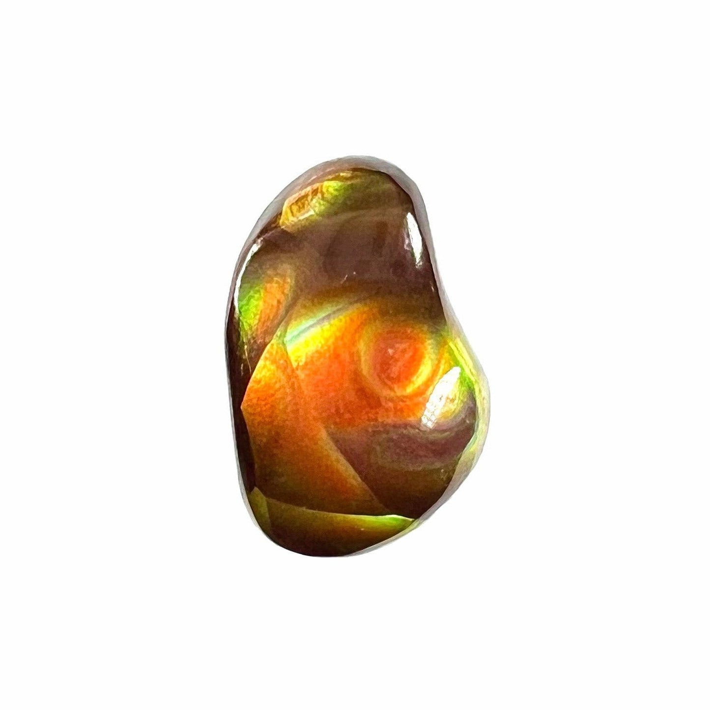 A loose, imperial grade Mexican fire agate gemstone.  The stone has a bull's eye pattern.