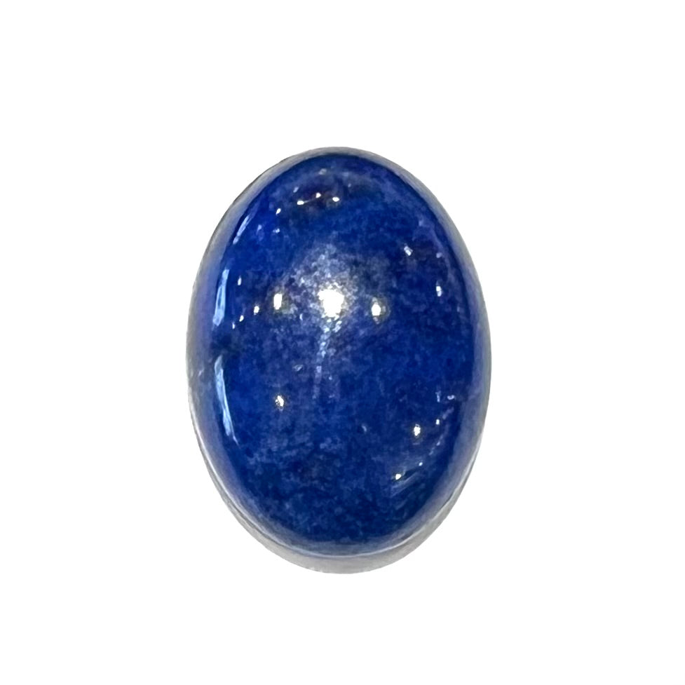 A loose, oval cabochon cut lapis lazuli stone from Blue Mountain, Afghanistan.