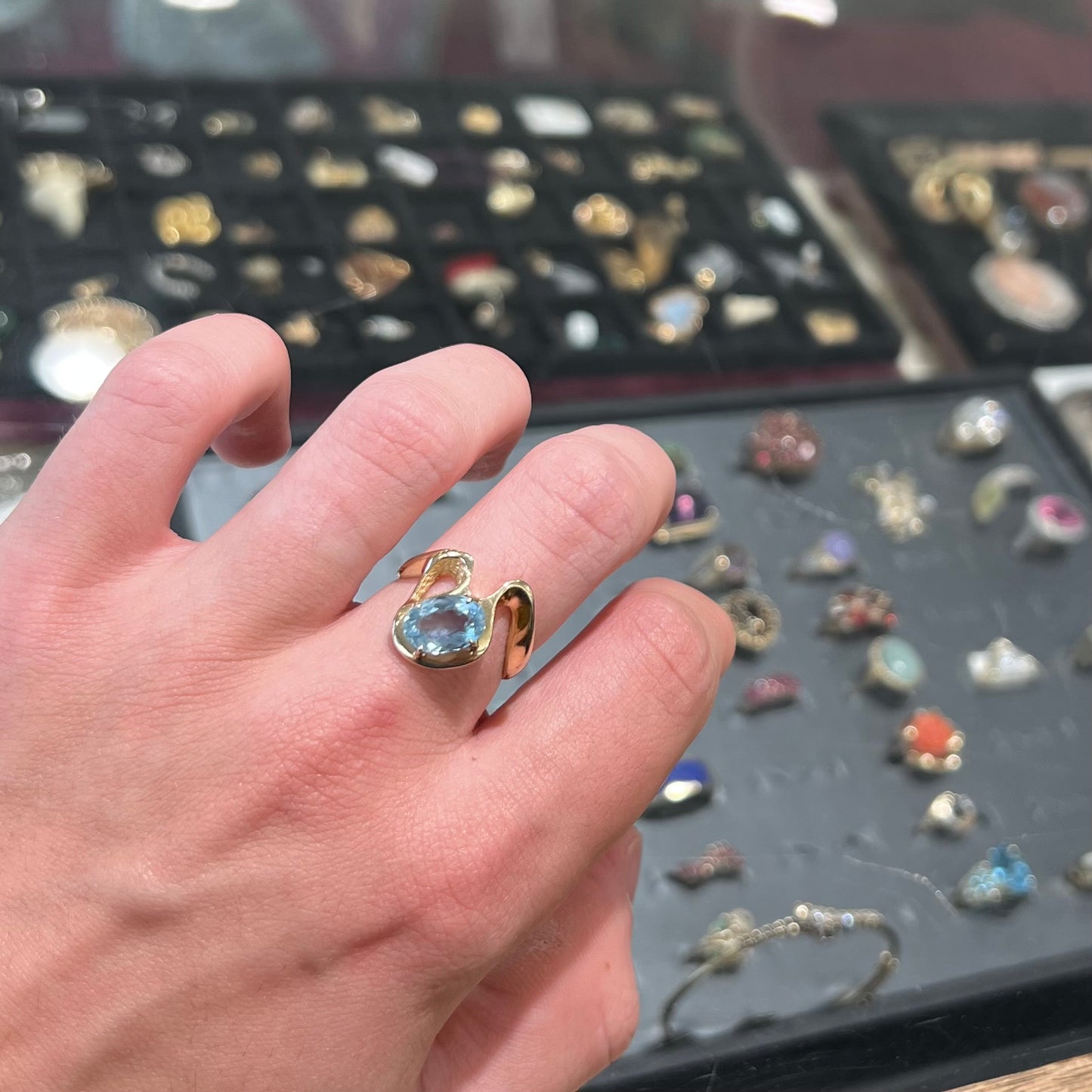 A ladies' estate yellow gold aquamarine solitaire ring. The aquamarine is oval cut.