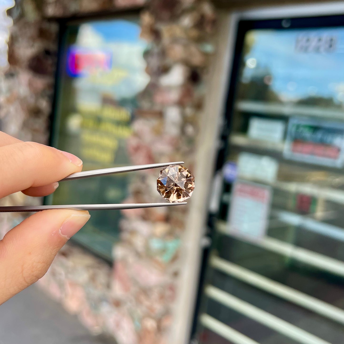 A loose, modified brilliant Portuguese cut smoky quartz gemstone.