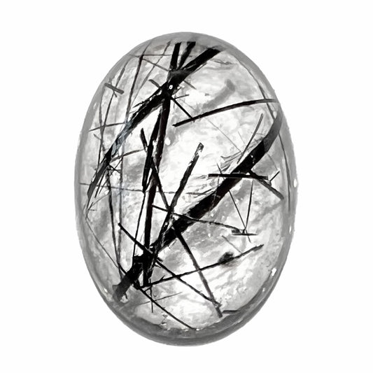 A loose, oval cabochon cut clear quartz stone with black tourmaline needle inclusions.  The gemstone weighs 13.05 carats.