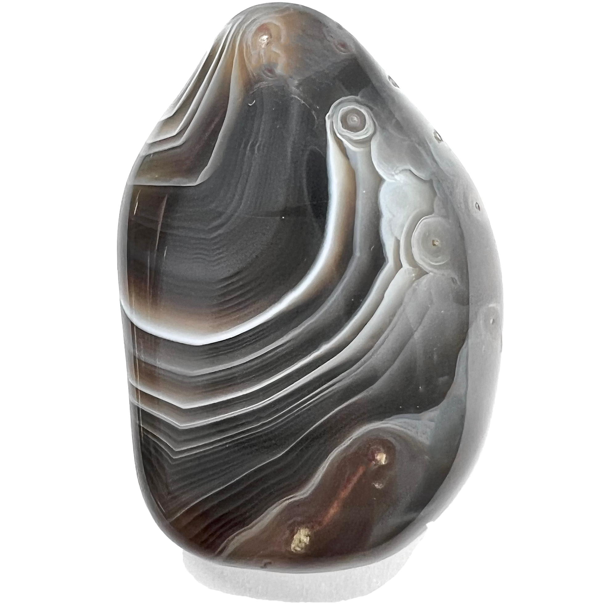 A tumble polished piece of banded agate stone.  The stone is dark gray with white and brown bands.