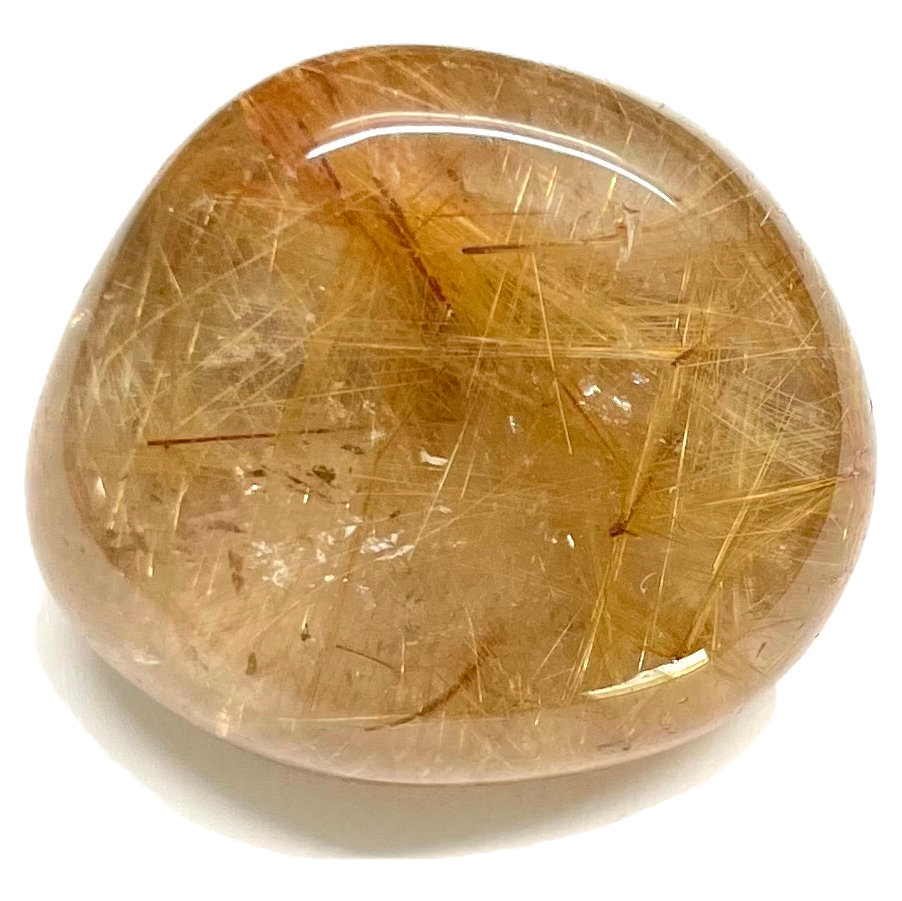 A tumbled rutilated quartz stone.  Clusters of golden rutile inclusions are seen in the clear quartz.