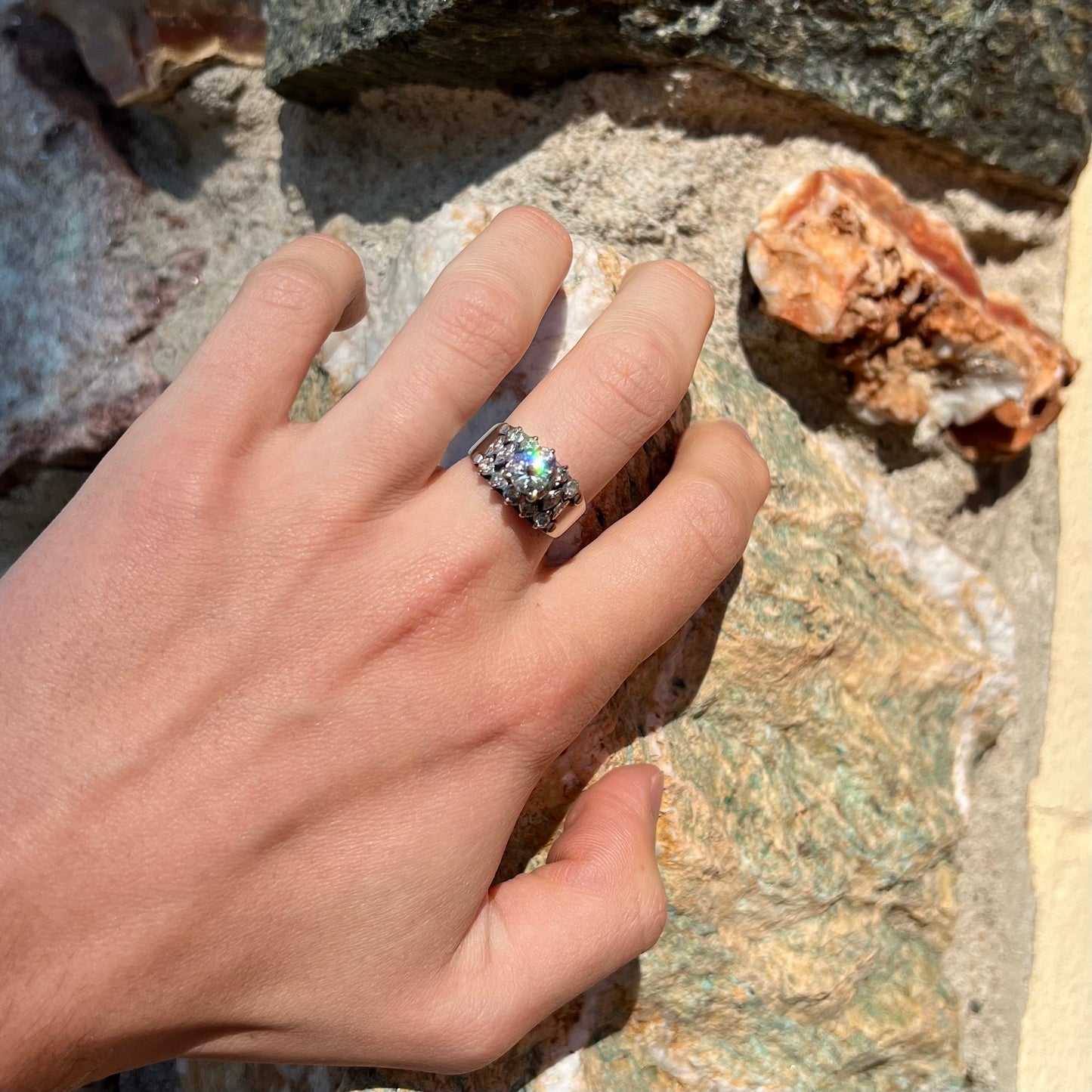 A vintage, 1940's style white gold diamond wedding ring set with a 0.68ct round diamond. The diamond has a noticeable black crystal inclusion.