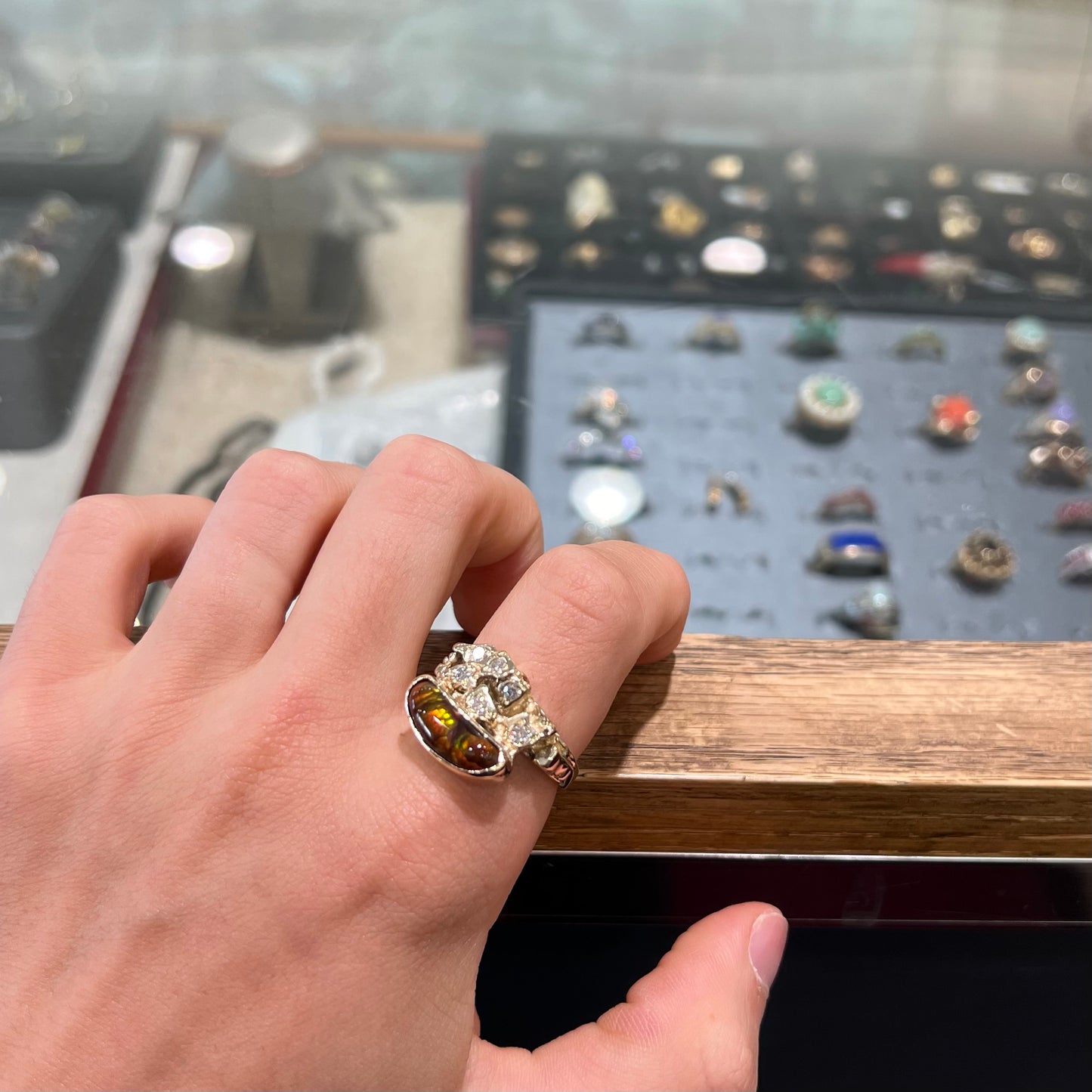 A ladies' nugget style yellow gold Mexican fire agate and diamond ring.