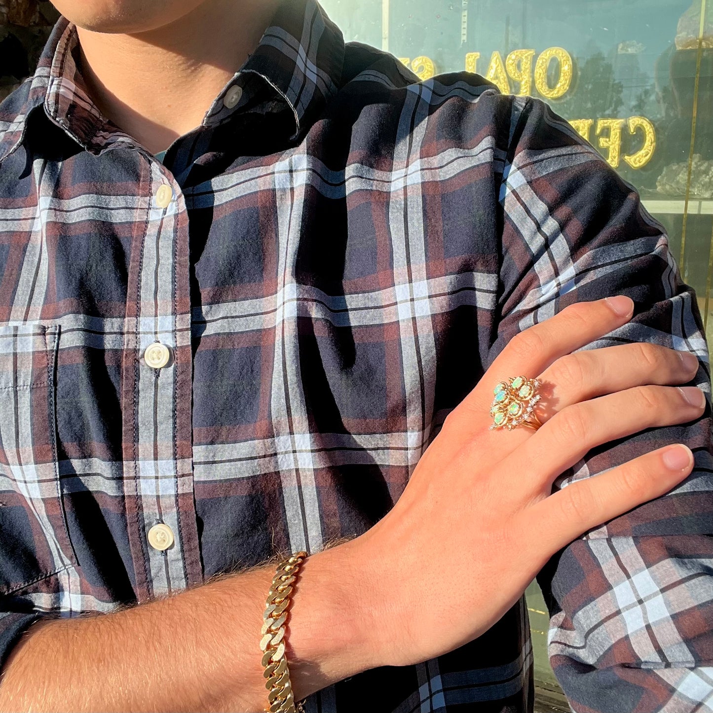 A ladies' vintage mid-century modern style opal and diamond cluster ring in yellow gold.