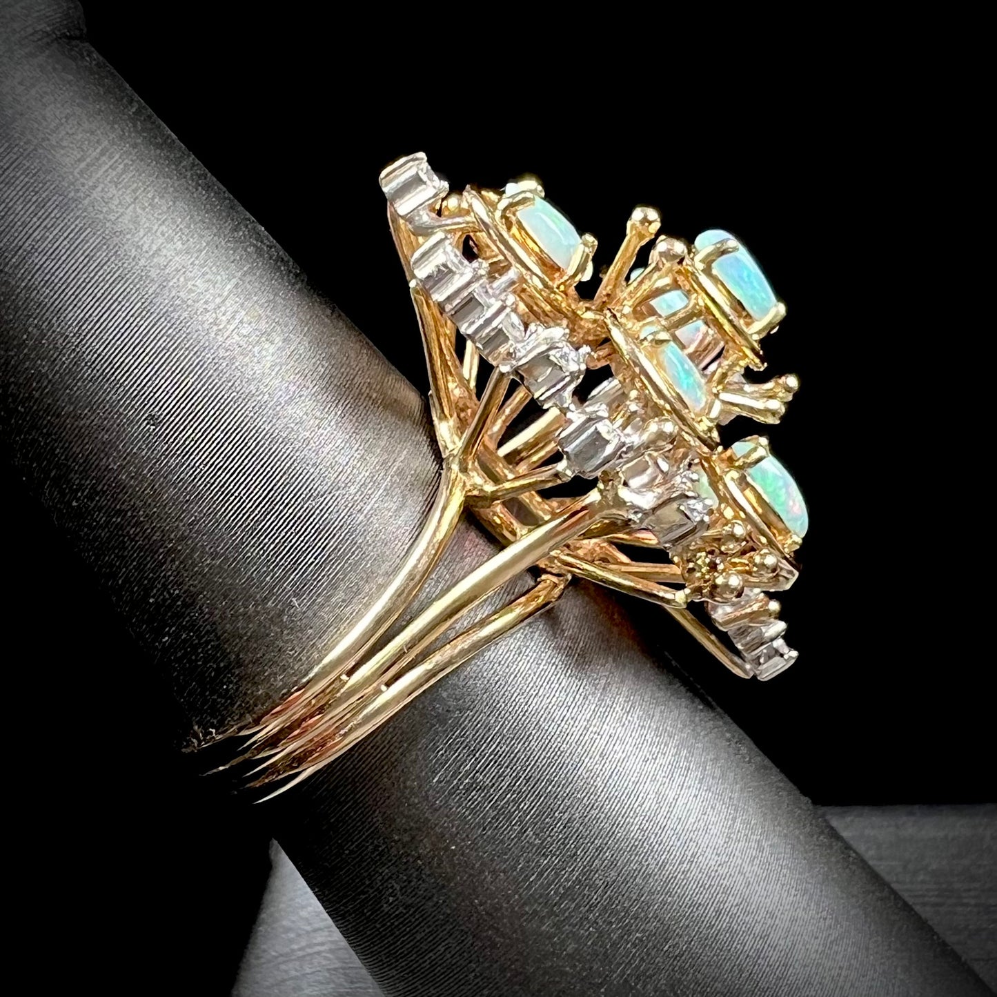 A ladies' vintage mid-century modern style opal and diamond cluster ring in yellow gold.