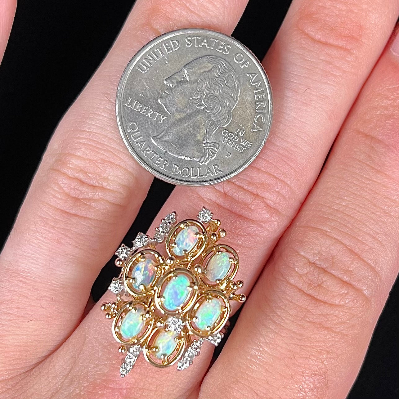 A ladies' vintage mid-century modern style opal and diamond cluster ring in yellow gold.