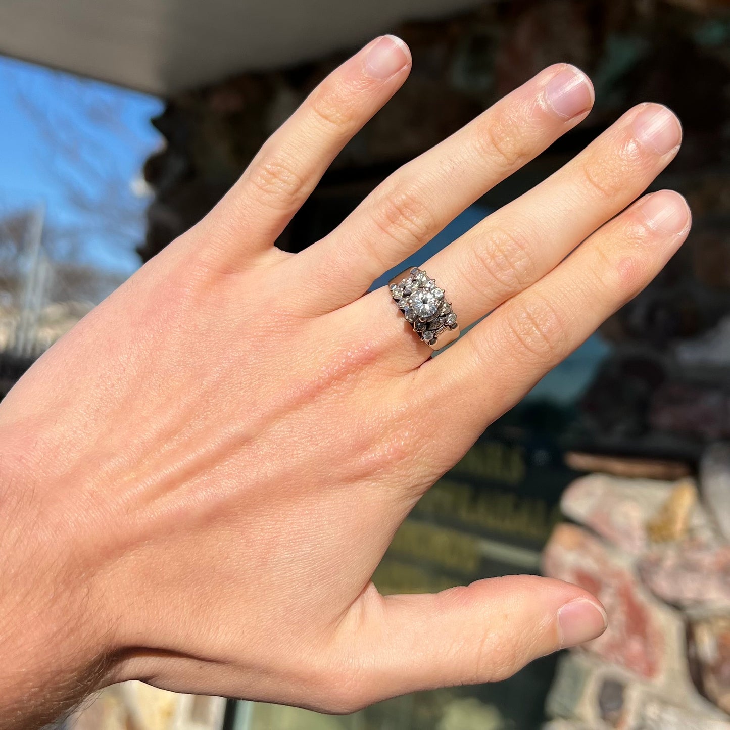 A vintage, 1940's style white gold diamond wedding ring set with a 0.68ct round diamond. The diamond has a noticeable black crystal inclusion.