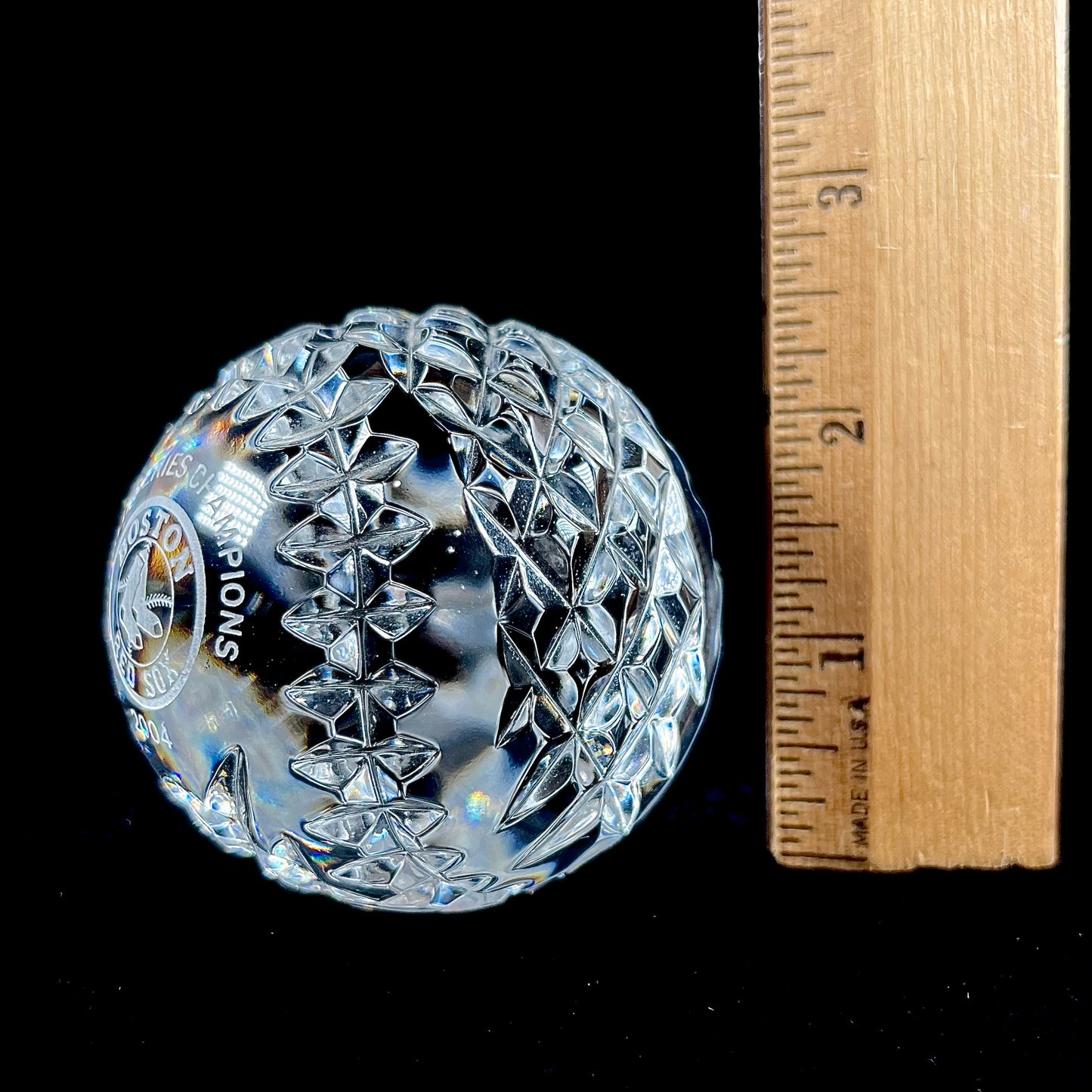 A baseball made from Waterford Crystal commemorating the Boston Red Sox 2004 World Series Championship.
