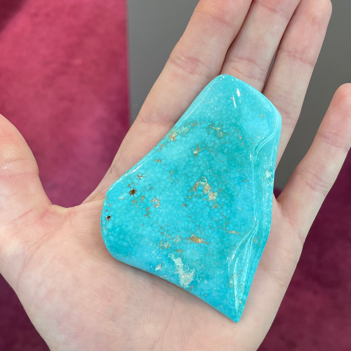 A large, polished baby blue Sleeping Beauty turquoise specimen.
