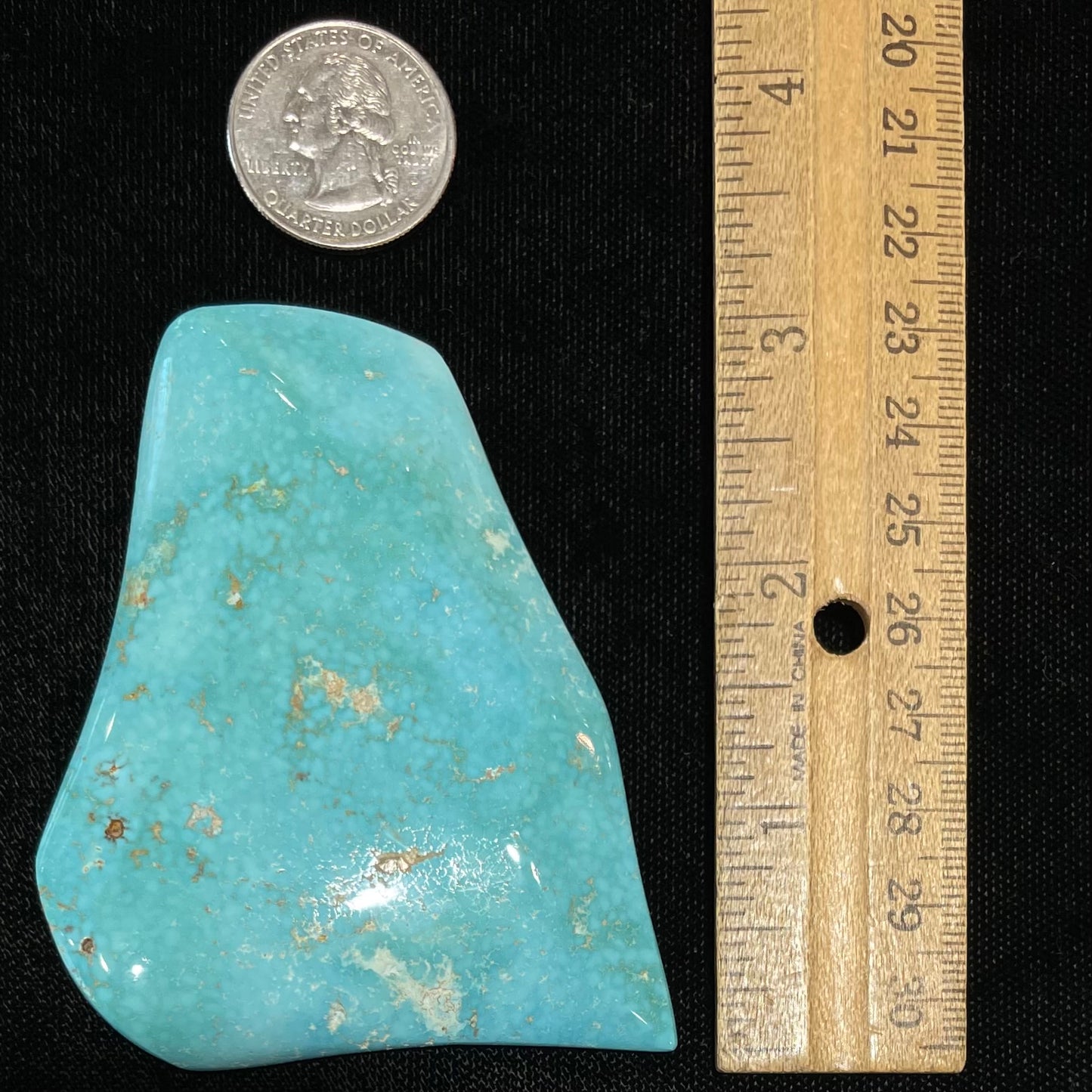 A large, polished baby blue Sleeping Beauty turquoise specimen.