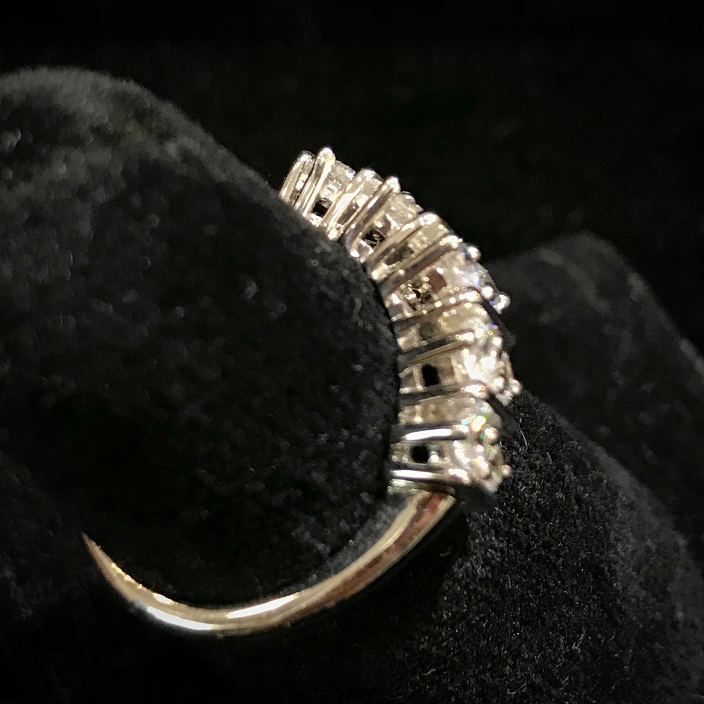 White Cubic Zirconia ring band set in sterling silver.
