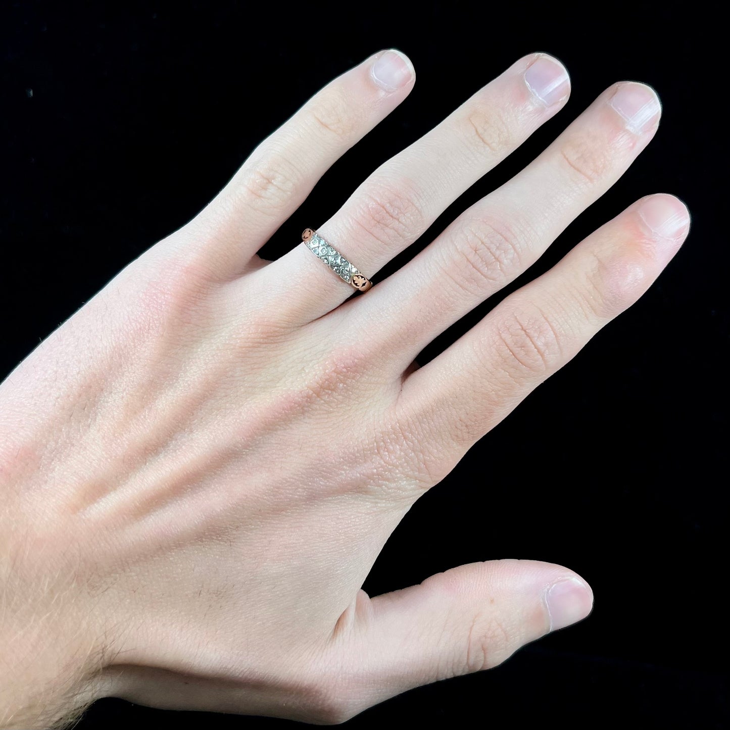 An antique yellow gold ladies' band set with old European cut diamonds.