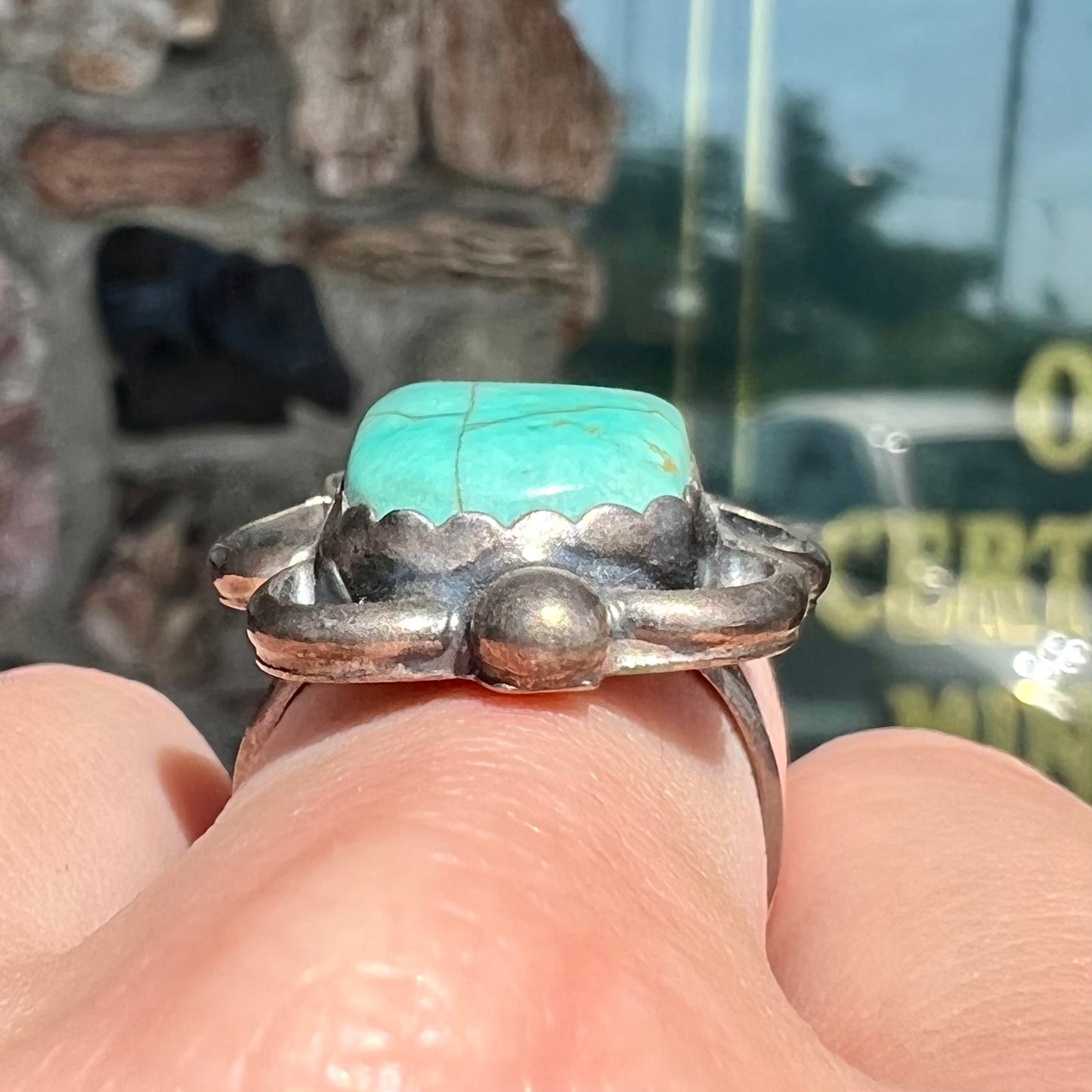 An estate sterling silver turquoise ring. The ring was handmade by Navajo artist, Roy Buck.