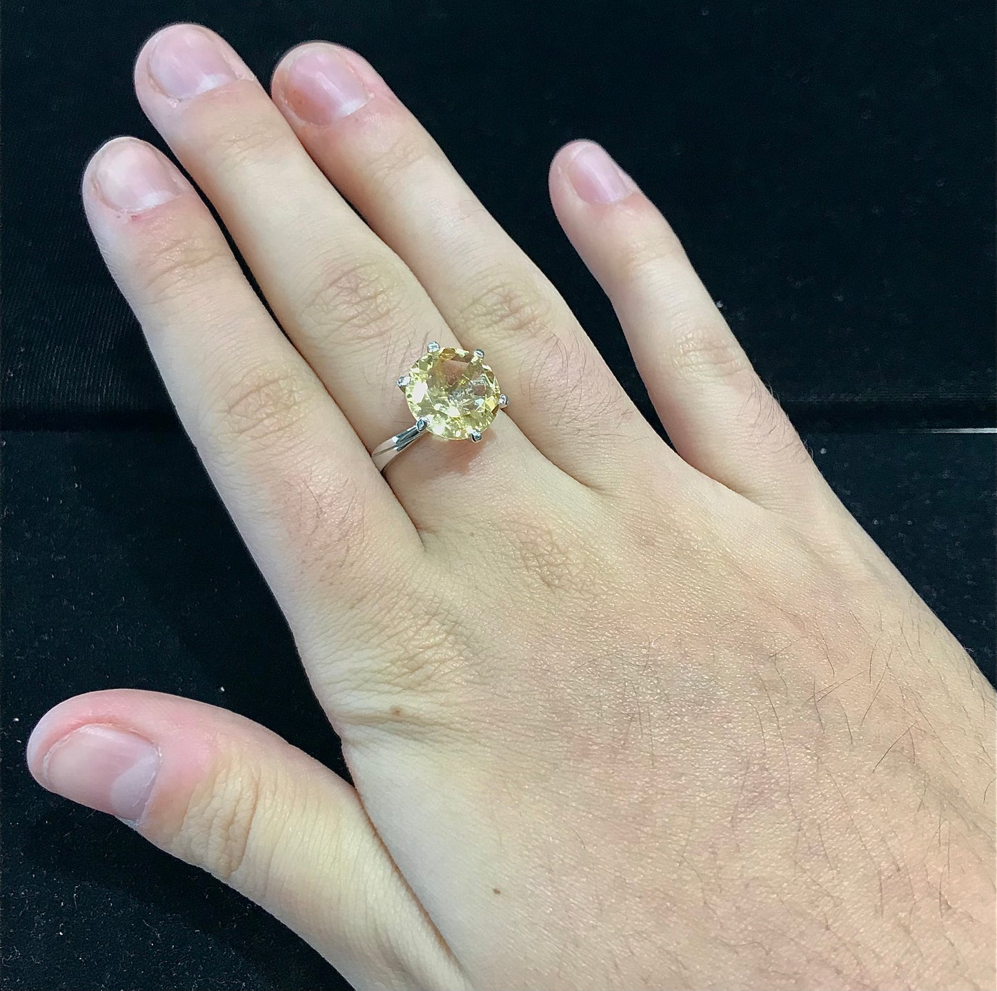 Light yellow citrine ring set in sterling silver.