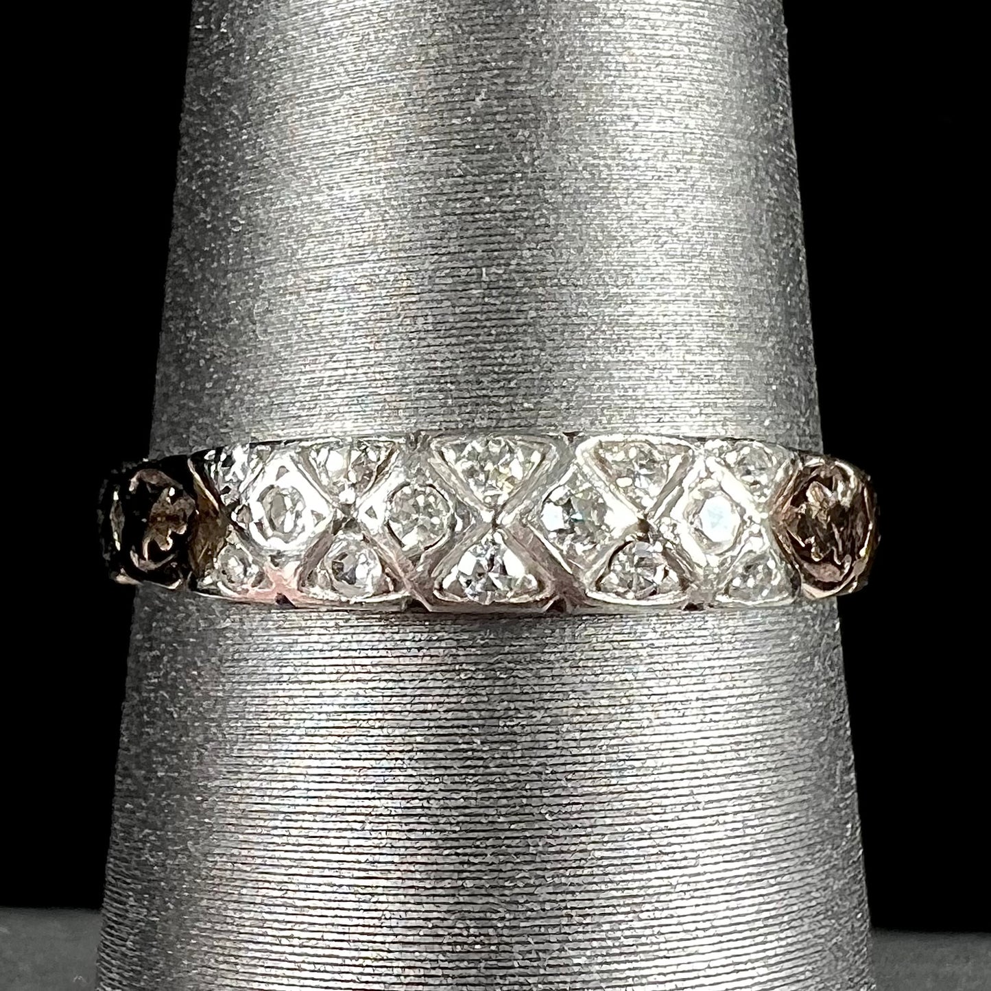 An antique yellow gold ladies' band set with old European cut diamonds.