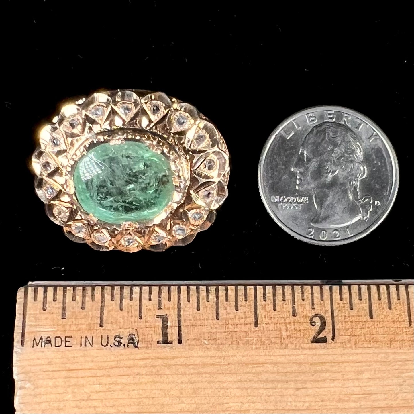 An antique 1800's Victorian emerald and diamond crystal brooch made in 18kt yellow gold.