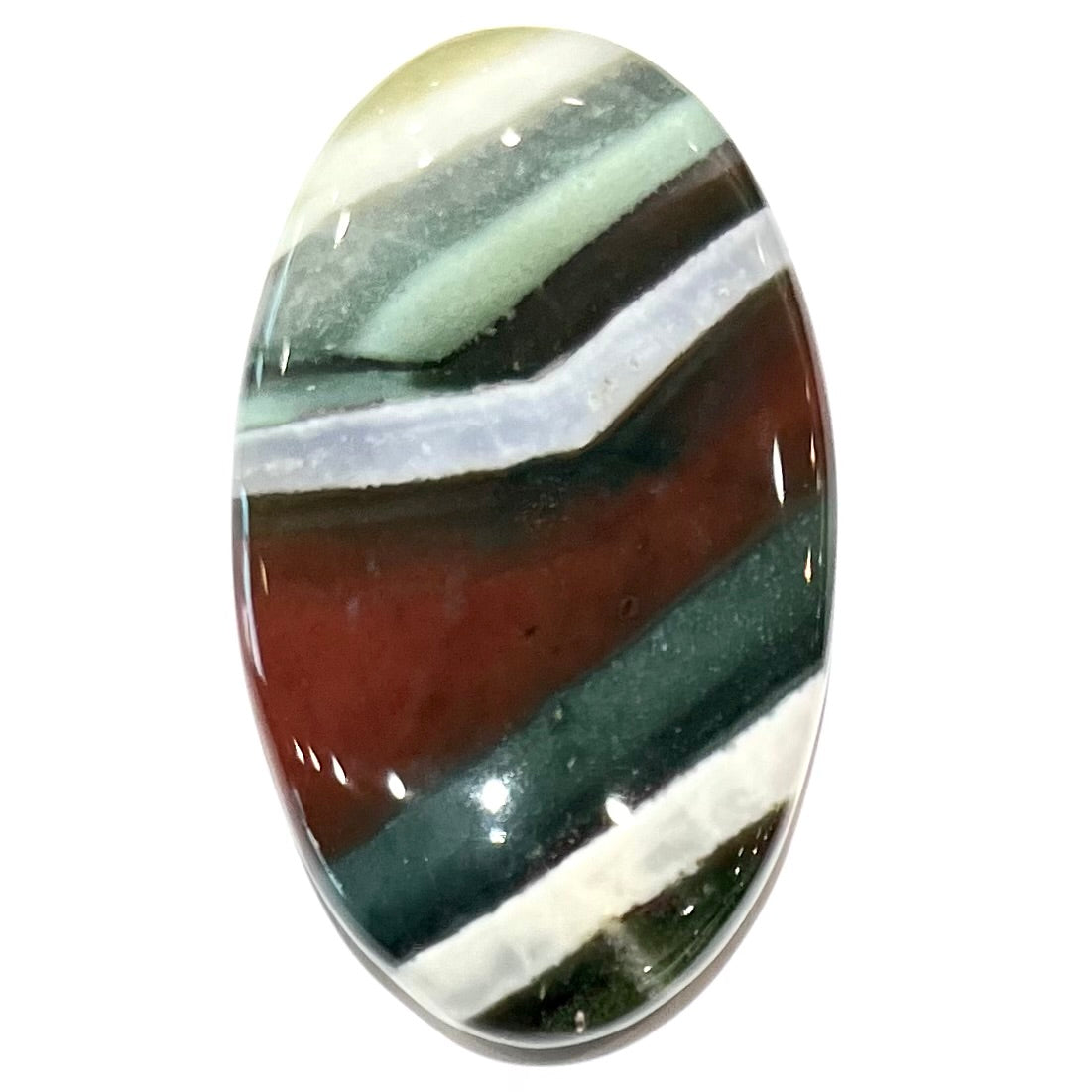 Loose Arizona agate cabochon for sale set on white background. Stone is striped with red, green, and white.