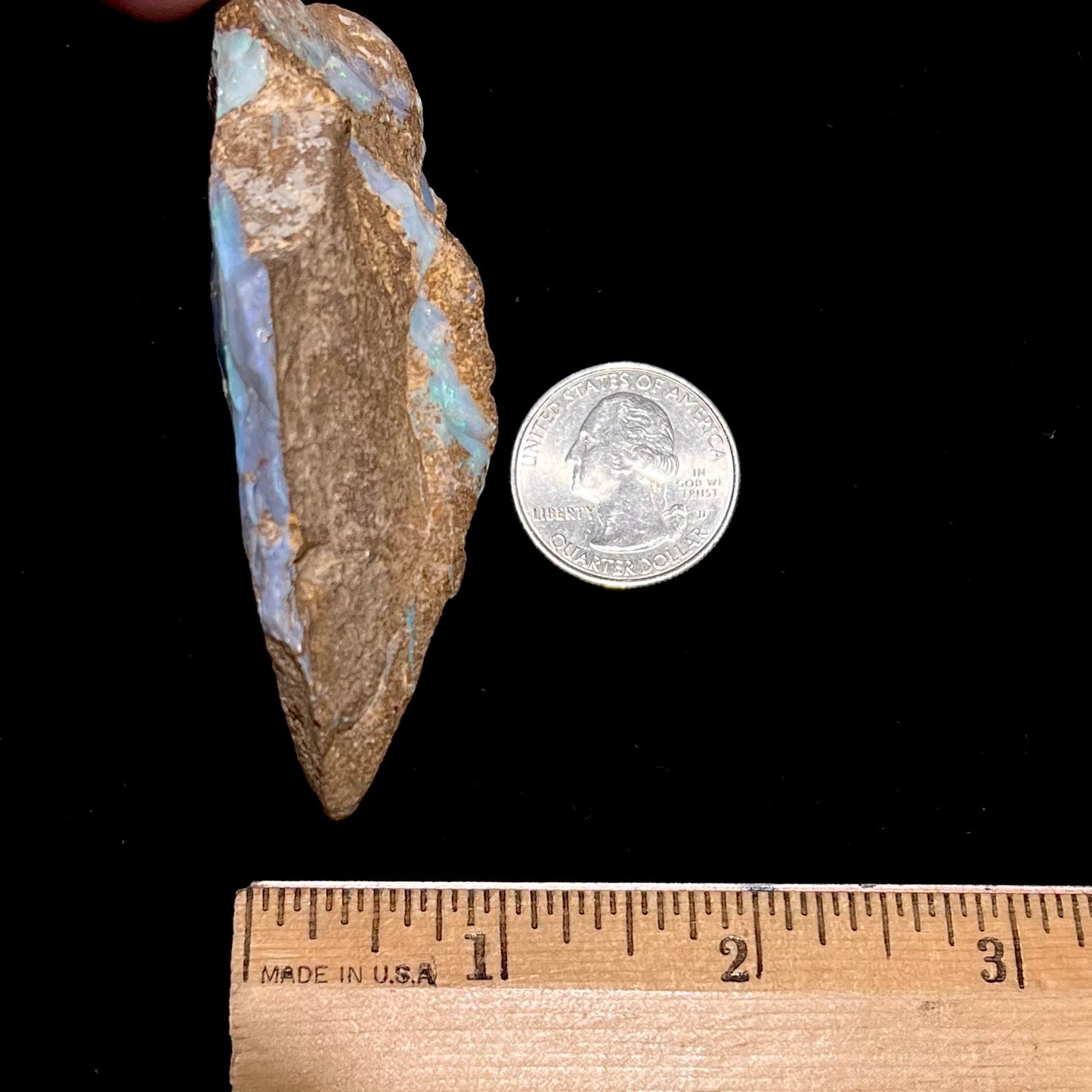 A rough boulder opal stone from Queensland, Australia.