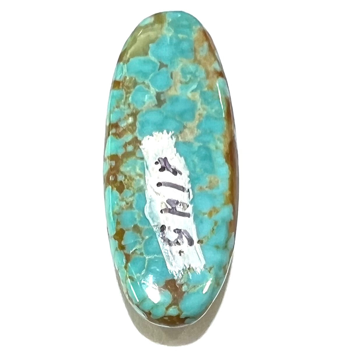 An oval cabochon cut loose turquoise stone from the Number 8 Mine in Nevada. Blue with chocolate matrix.