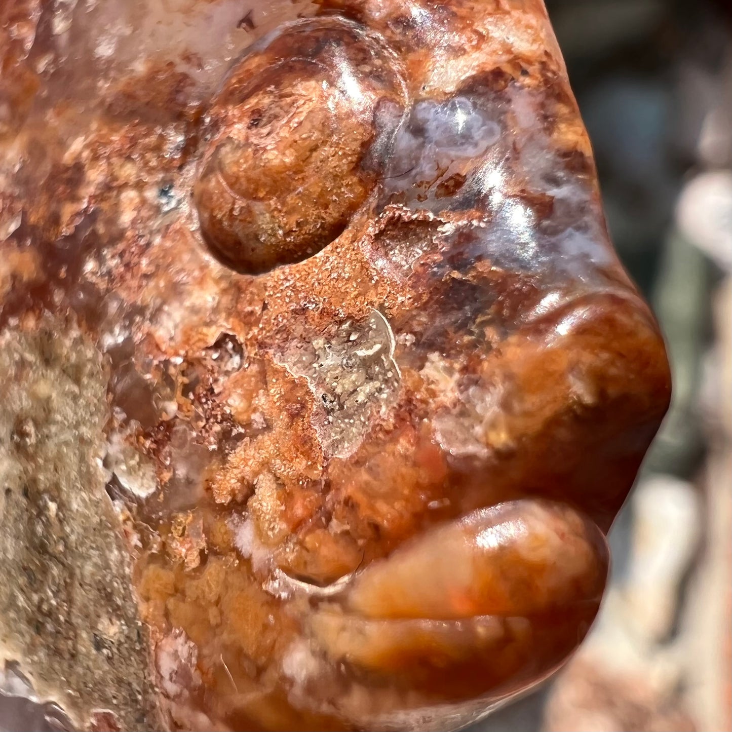 A stone fish carved from Northern Mexican fire agate. The material is brown and white. He do be sexy tho.