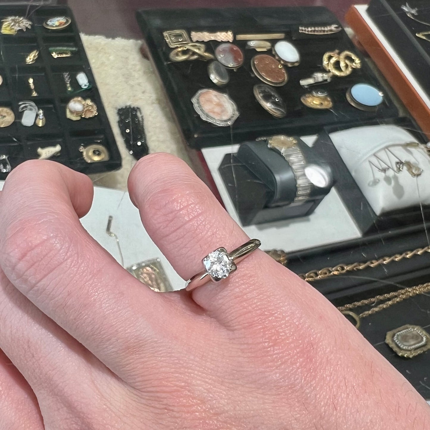 A ladies' vintage 14kt white gold 1940's diamond solitaire ring. The diamond is chipped in two places.