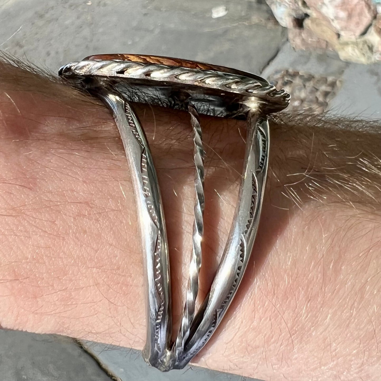 A sterling silver rope bezel set picture jasper cuff bracelet.