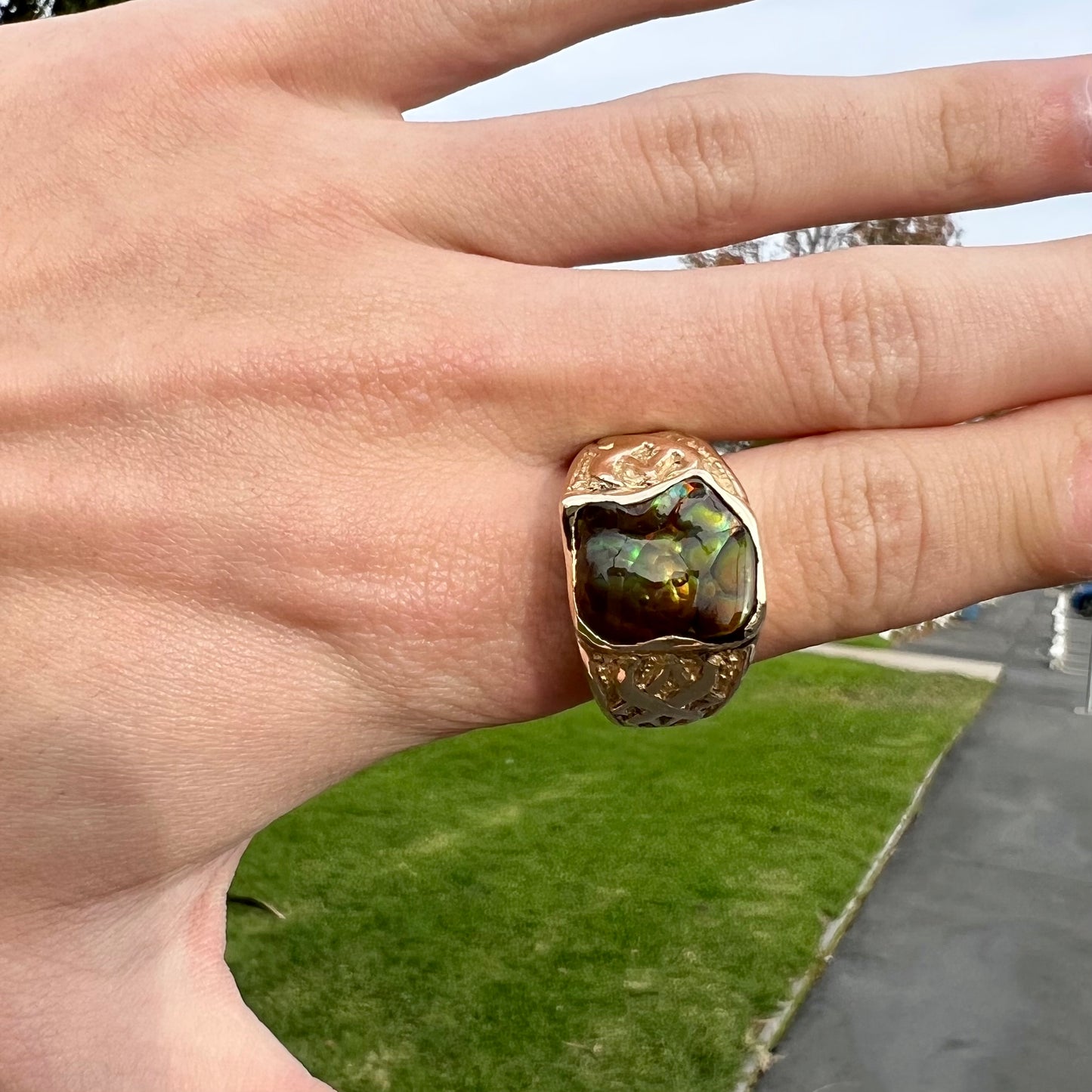 Custom, heavy yellow gold men's ring set with fire agate from Deer Creek, Arizona.