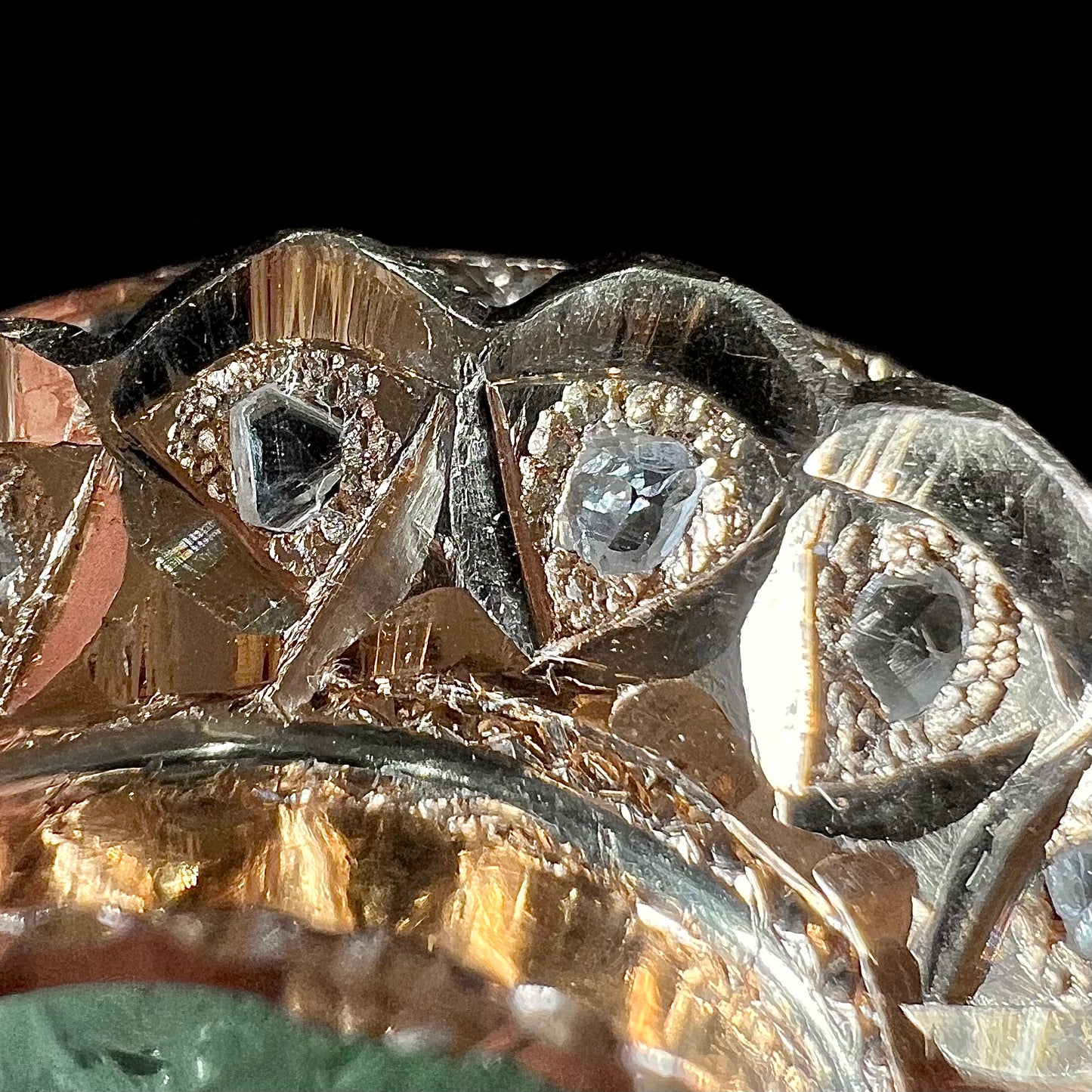 An antique 1800's Victorian emerald and diamond crystal brooch made in 18kt yellow gold.