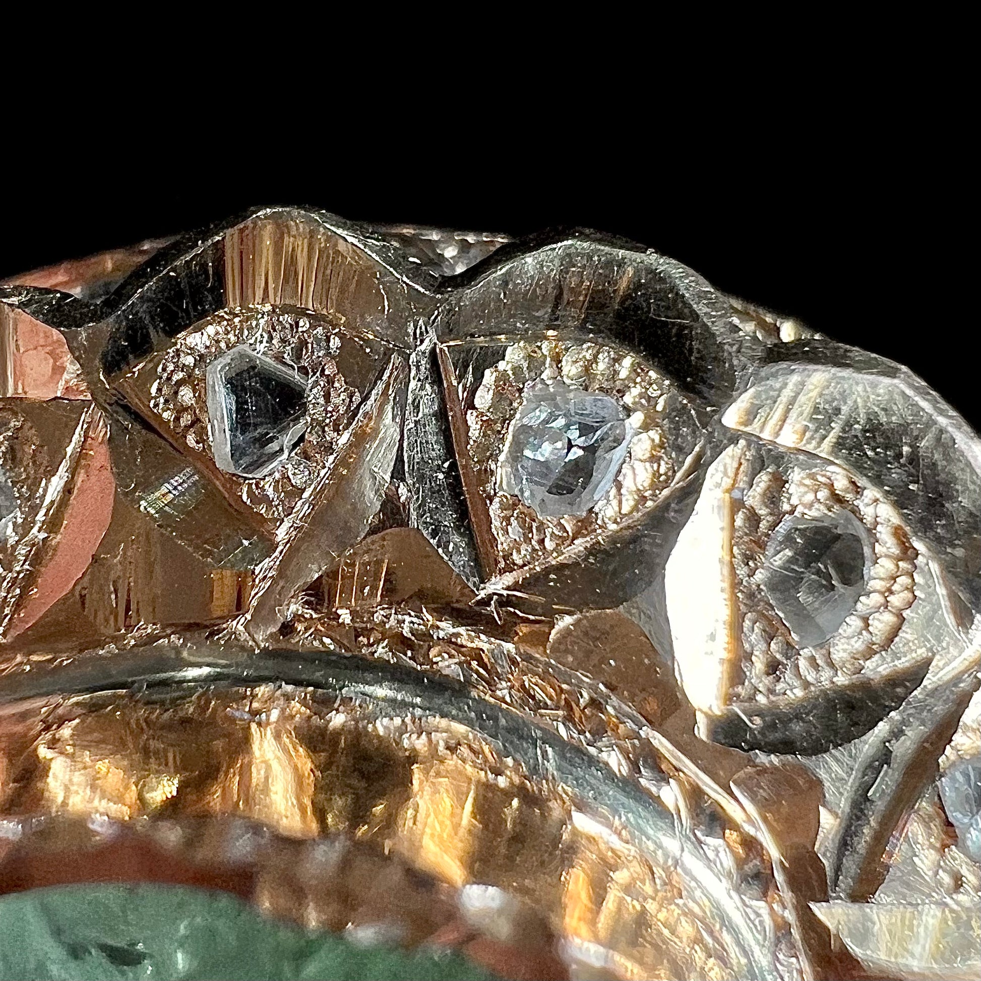 An antique 1800's Victorian emerald and diamond crystal brooch made in 18kt yellow gold.