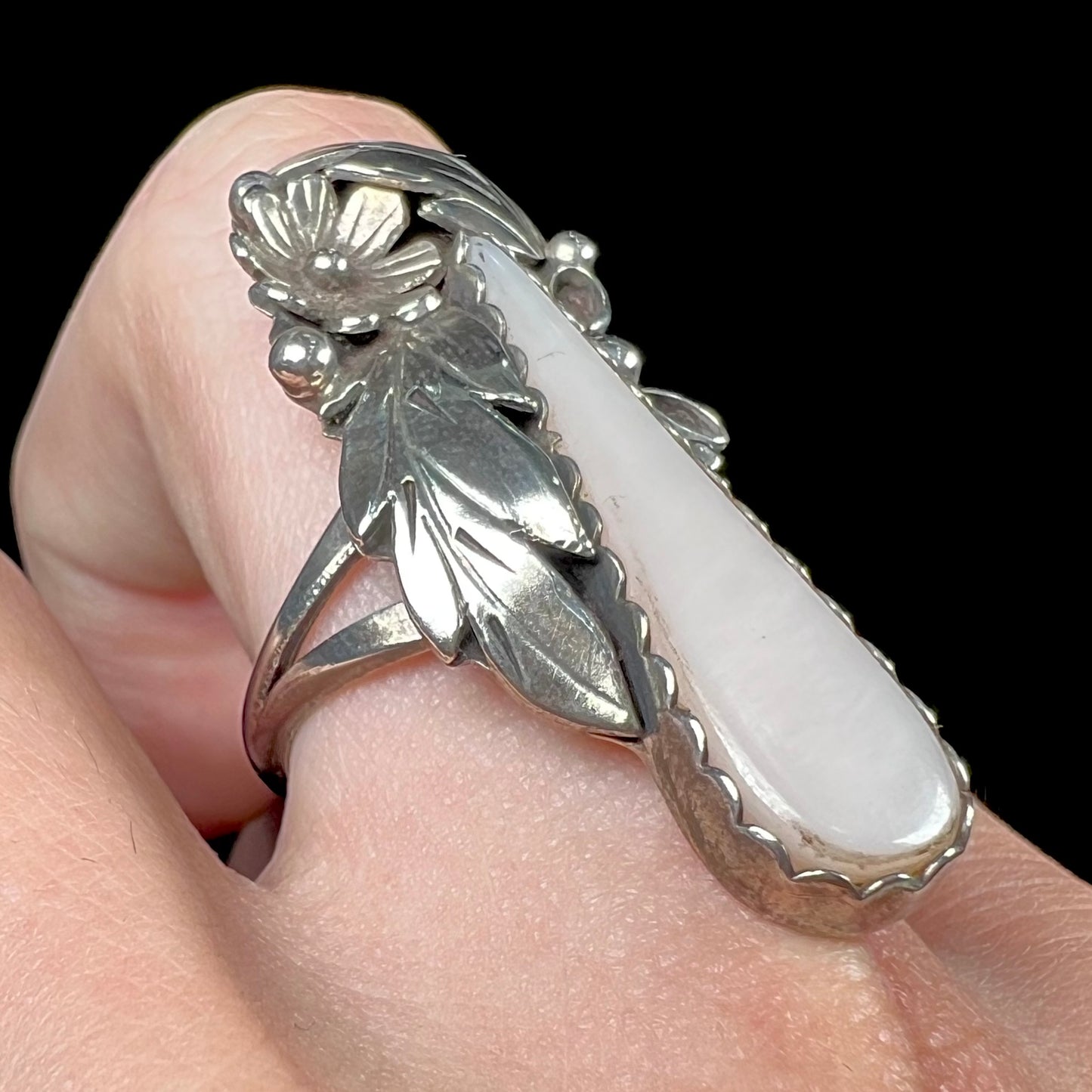 A sterling silver mother of pearl drop ring handmade in Navajo style, signed "MORNINGSTAR."