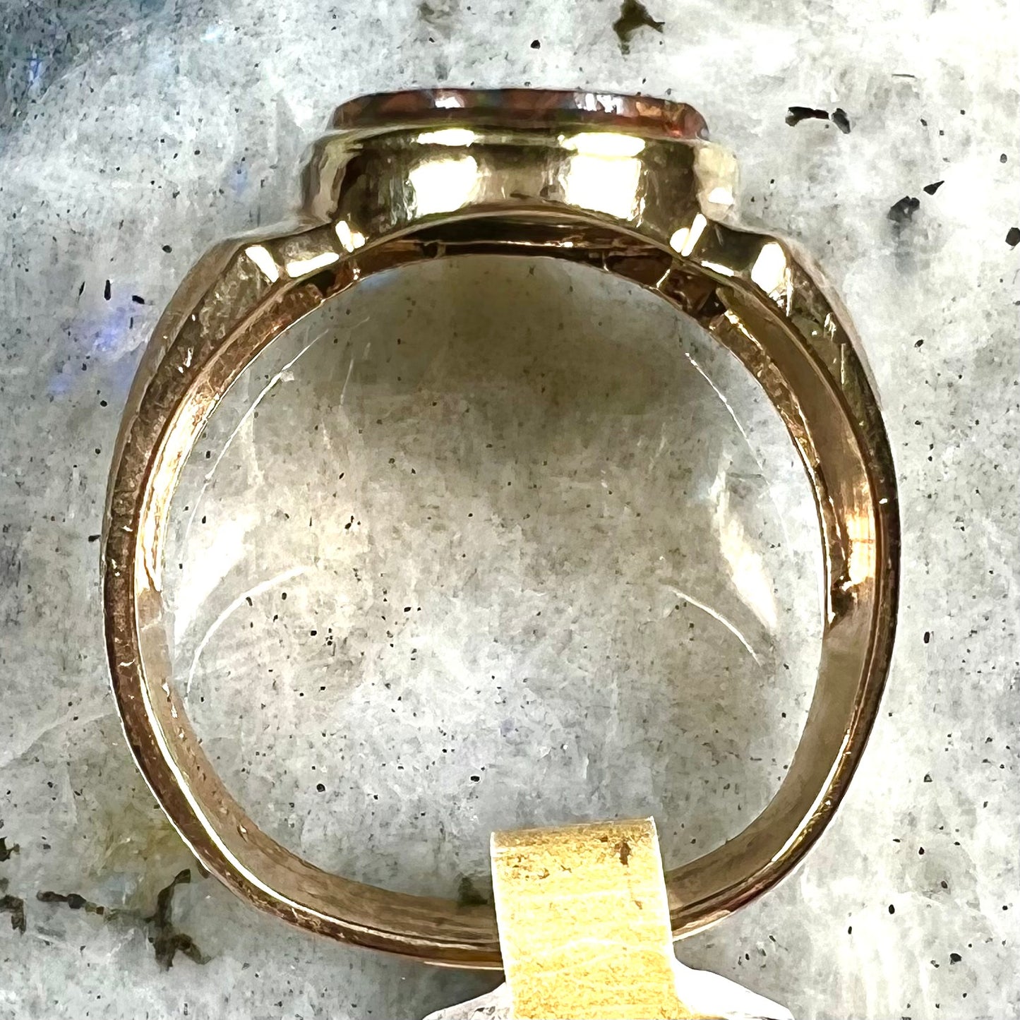A Koroit boulder opal men's ring in brushed yellow gold.
