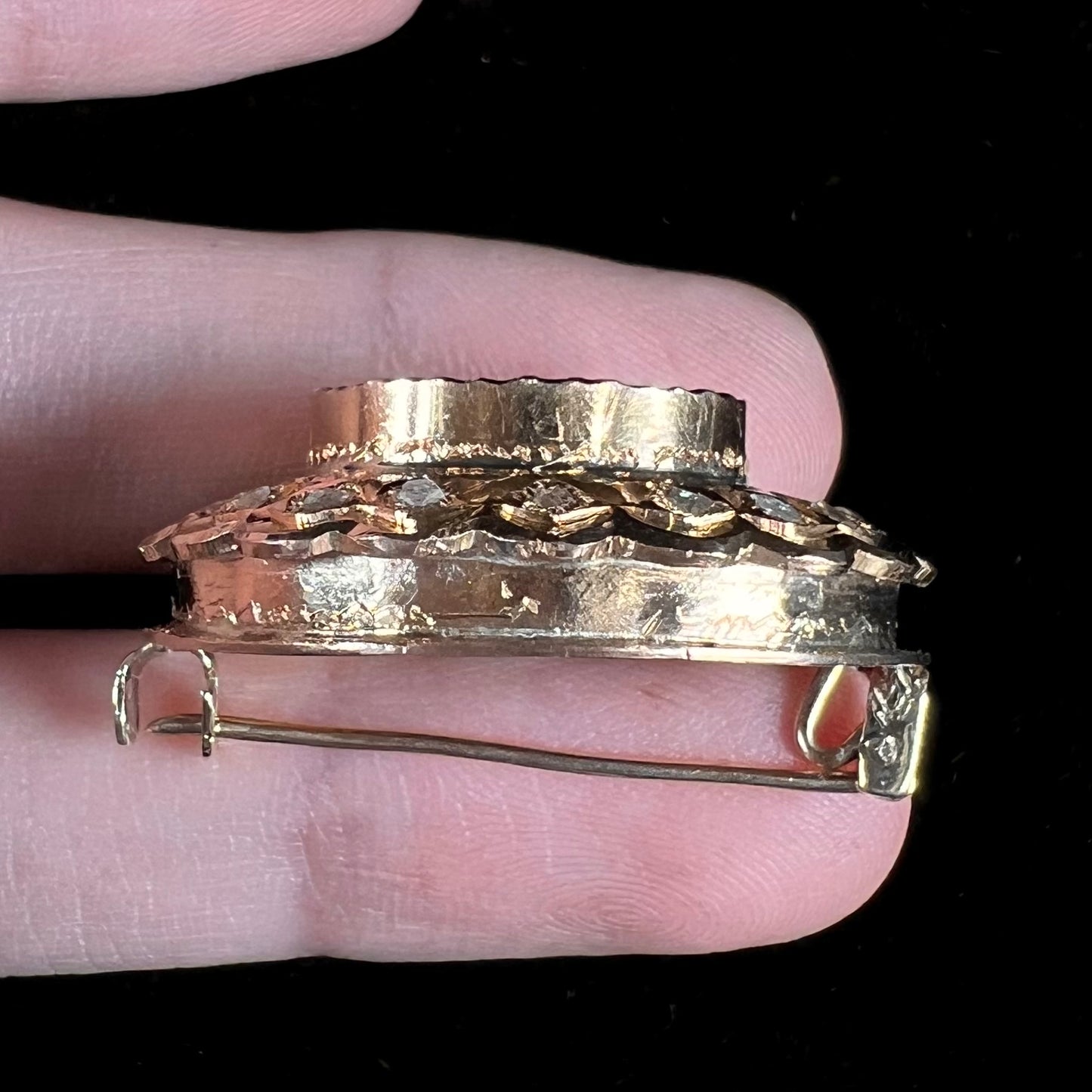An antique 1800's Victorian emerald and diamond crystal brooch made in 18kt yellow gold.