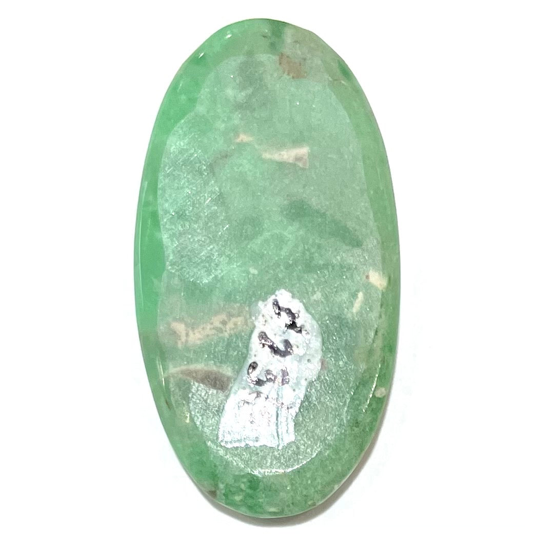 A loose, oval cabochon cut variscite stone from Utah, USA.