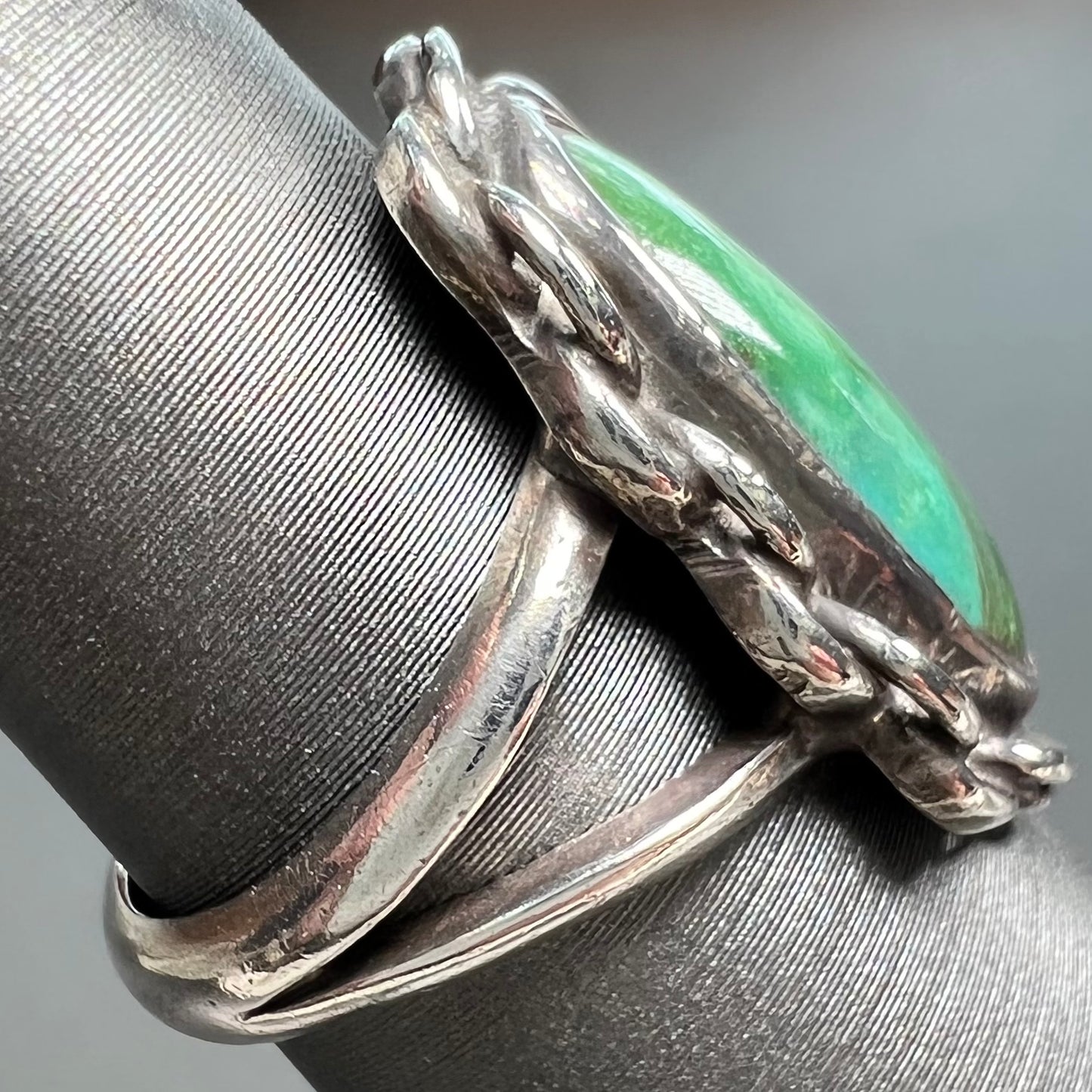 A handmade, split shank, sterling silver ring bezel set with a green variscite stone from Utah, USA.