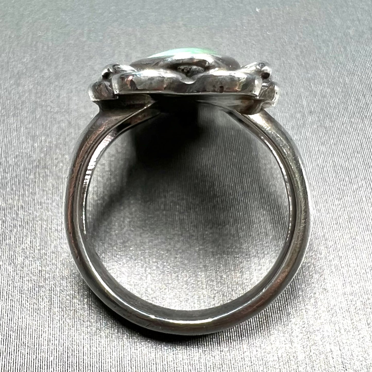 A handmade, split shank, sterling silver ring bezel set with a green variscite stone from Utah, USA.
