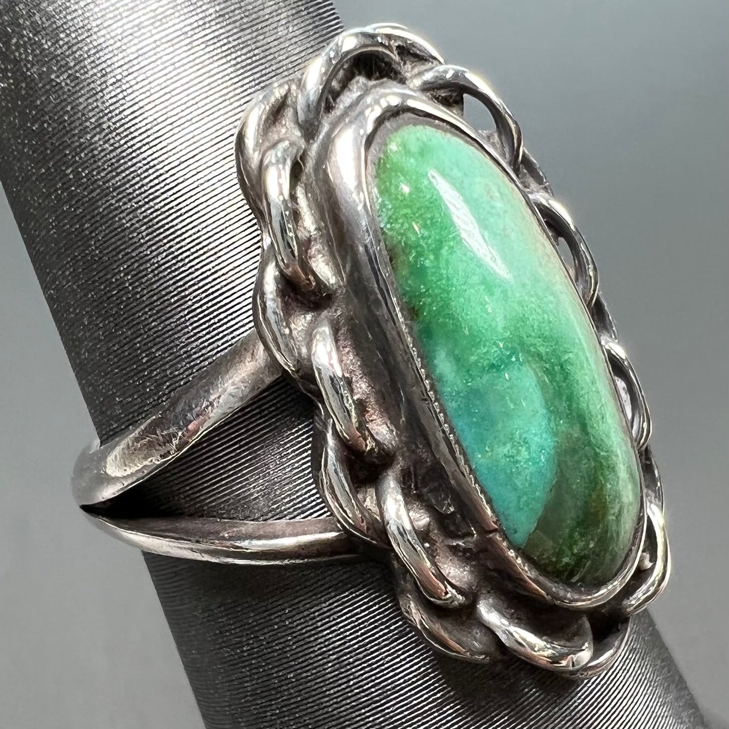 A handmade, split shank, sterling silver ring bezel set with a green variscite stone from Utah, USA.